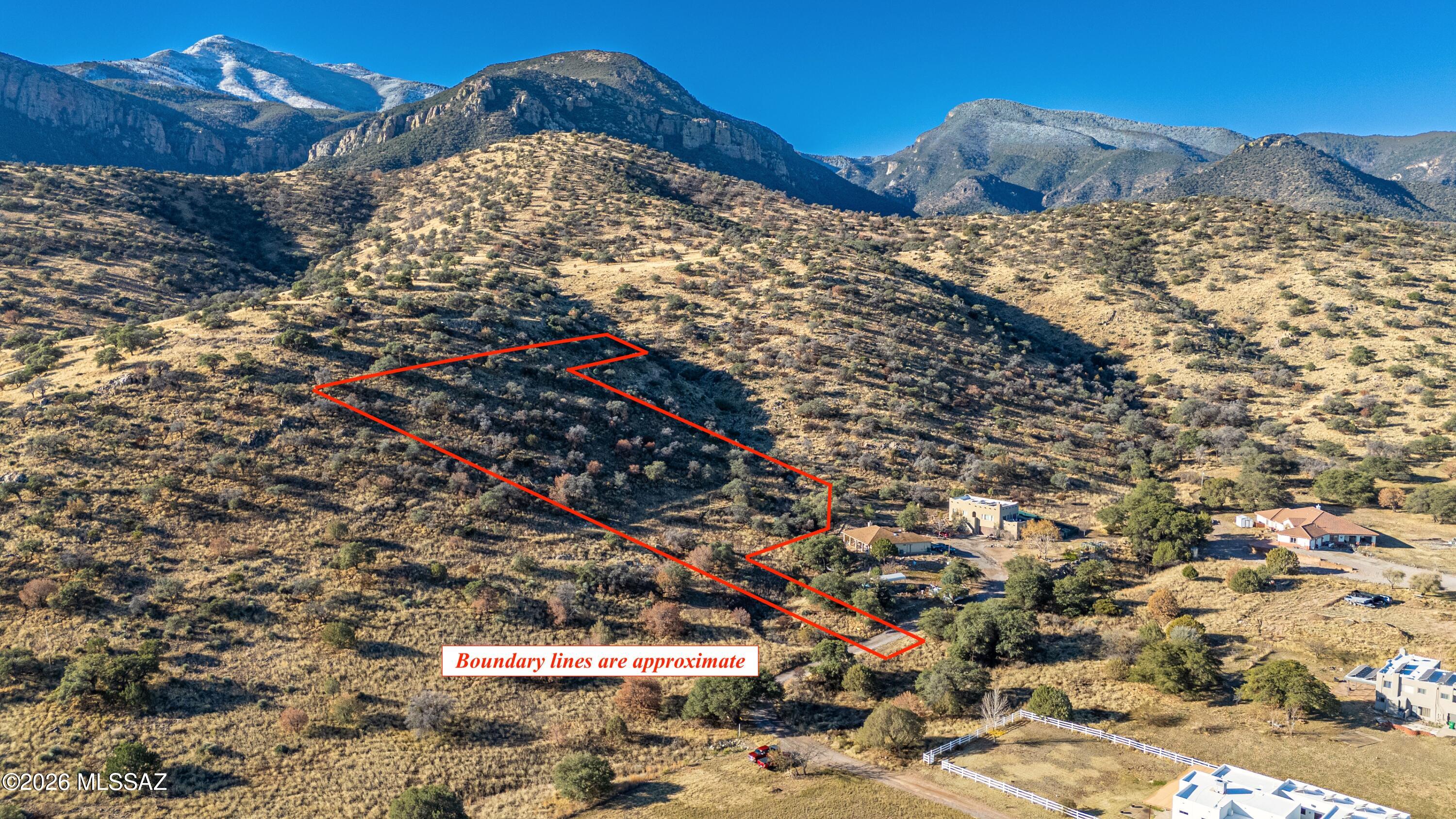 Percolation test and survey completed. Water (Liberty Water) and electric are at the property! Where the horizon opens and the land unfolds below, this remarkable two-acre homesite offers expansive views of the city, glowing valley lights, and dramatic canyon scenery. Surrounded by high-oak desert and bordering national forest to the south, the setting feels peaceful and private, with deer, turkey, and native wildlife frequently passing through. Enjoy quiet mornings, brilliant star-filled nights, and the freedom of no HOA to create a home that reflects your vision. Set among distinctive custom residences, this rare parcel invites you to build a true retreat.