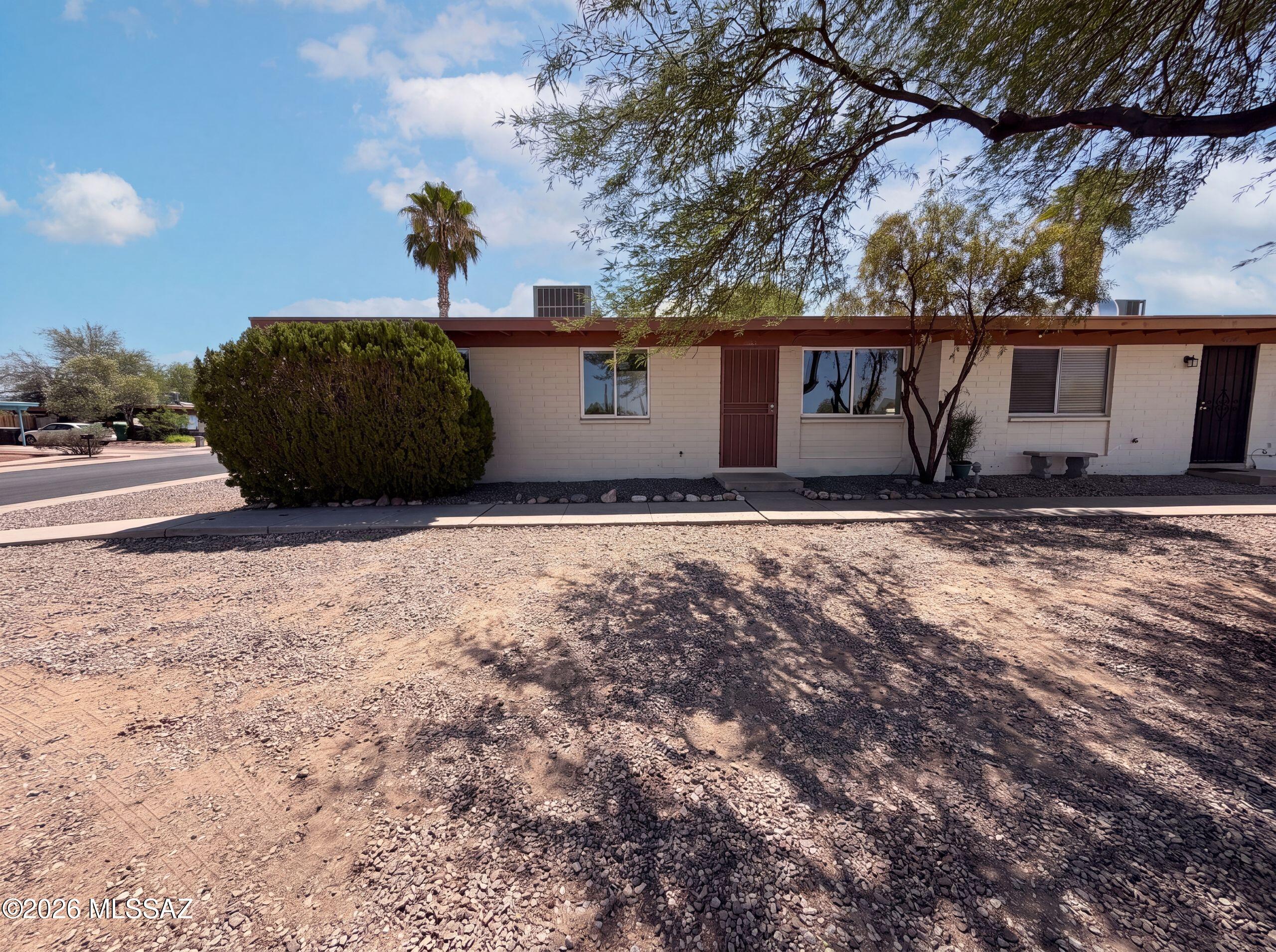 Don't miss 4002 S Lazy Palm Dr, an updated residence featuring fresh interior paint throughout and a kitchen equipped with all stainless steel appliances. A centrally located fireplace provides warmth and a focal point for living areas. This property is a perfect blend of modern finishes and everyday functionality.. Included 100-Day Home Warranty with buyer activation