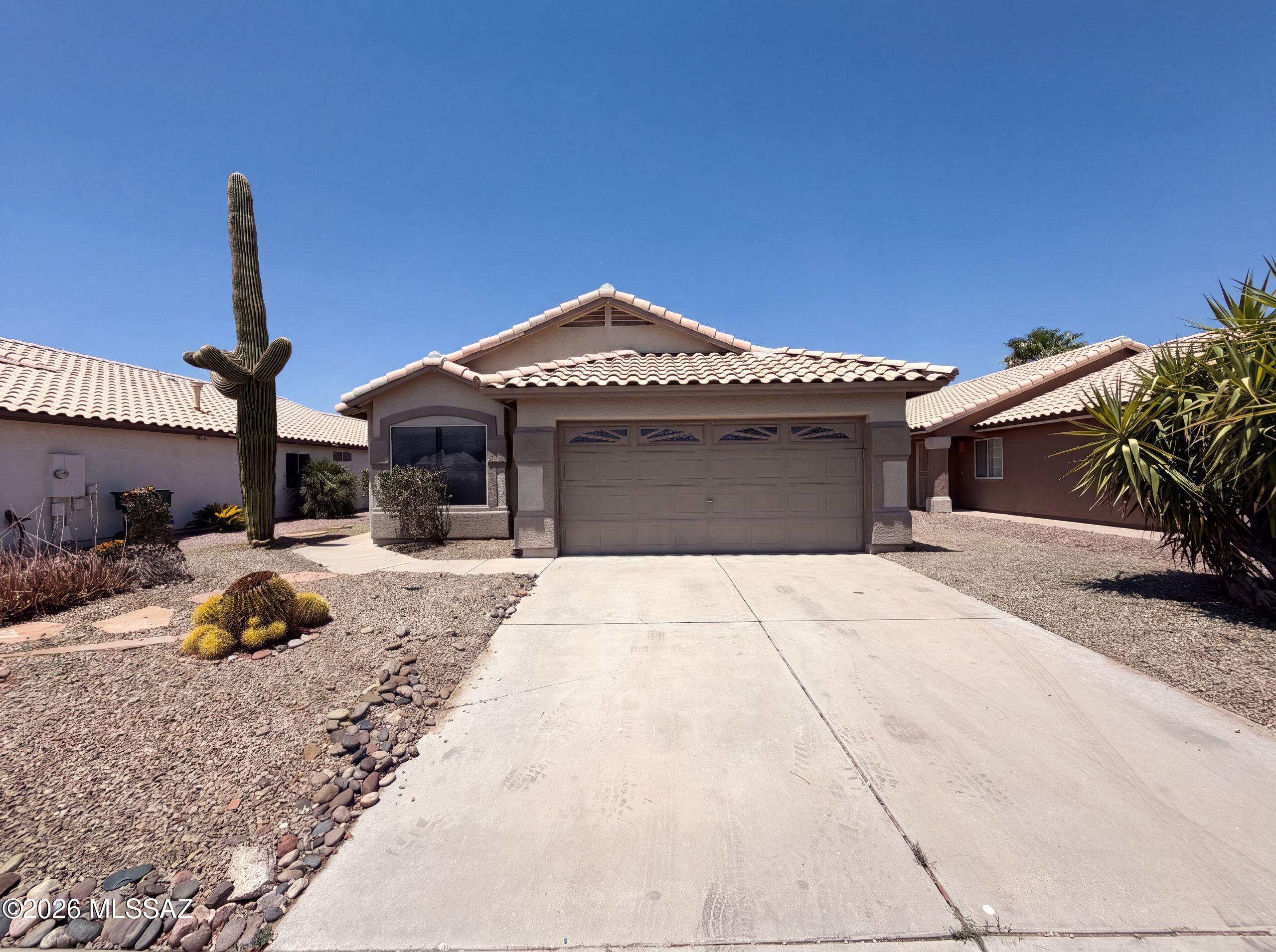 Step into 9103 N Palm Brook Dr, recently enhanced with fresh interior paint and partial flooring replacement throughout. The kitchen features all stainless steel appliances, while the primary bathroom includes double sinks and a separate tub and shower. A covered patio in the back yard extends the functional exterior space. This refreshed residence provides updated comfort and practical outdoor living.. Included 100-Day Home Warranty with buyer activation