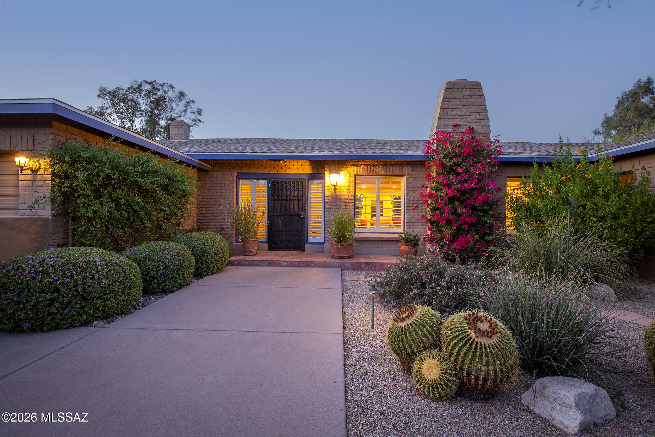 Meticulously cared for, historic, Territorial Style home, 4 Br./3 Bath, 3,075 Sqft. on a beautiful, quiet, side street in high demand El Encanto.  Perfect neighborhood for walking & bike riding in Central Tucson.  Sprawling, open living area from front to the back of the home with large window to the covered patio,/pool/spa.  Remodeled kitchen & bathrooms with quartz counters, Energy star appliances.  Large dining room with window to backyard.  Closet & storage space galore. basement for more storage.  Mature vegetation (trees, etc.) surround the 1/2 acre property giving a quiet, country feel.