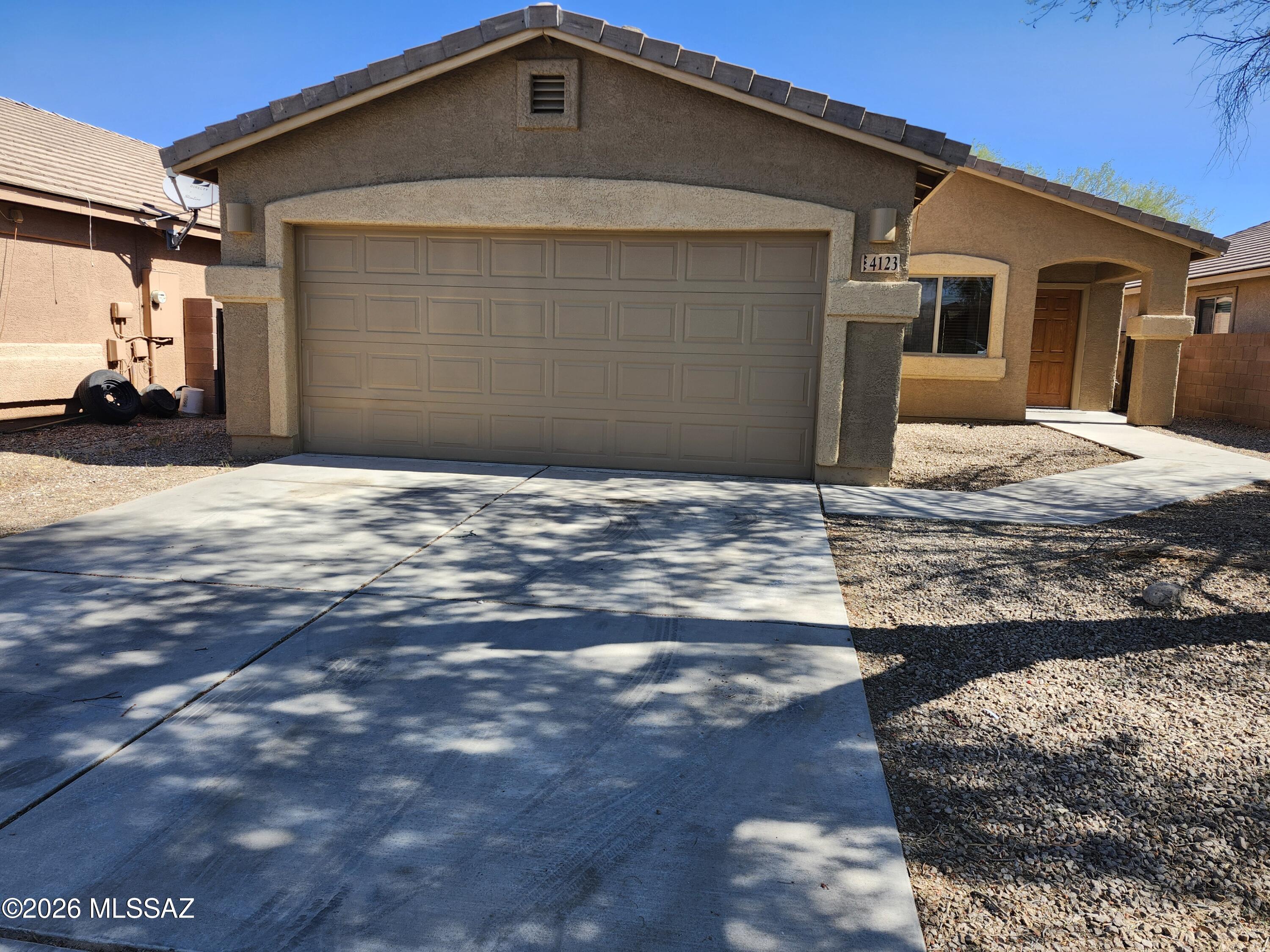 This well-maintained 3 bedroom, 2 bath home features a bright, open floor plan that has been freshly painted. Eat in kitchen, stainless steel appliances, dinette and ample cabinetry. Larger Primary Suite with walk in closet. Enjoy new carpet, upgraded flooring and lighting throughout, stylish tile finishes, and a comfortable living space. The fabulous, large backyard offfers a covered patio and low-maintenance landscape - perfect for entertaining. 2-car garage, equipped with A/C and conveniently located just minutes from I-10, this home is a perfect blend of comfort and convenience!