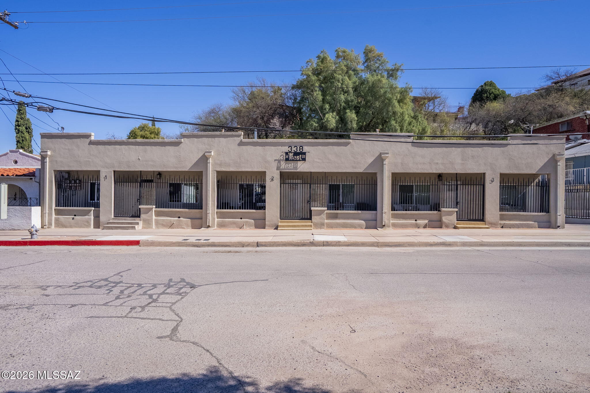 Excellent investment opportunity in Nogales. This well-maintained triplex property with a proven Airbnb rental history offers strong income potential and consistent guest appeal. Each of the three units features an identical floor plan with 2 bedrooms and 1 bathroom, designed for comfort and functionality. Every unit includes its own private laundry room equipped with a washer and dryer, providing added convenience for both short-term guests and long-term tenants. The property also offers practical parking with Apartment #3 featuring an extensive private parking area complete with a carport. Located downtown this triplex places guests and resident close to shopping, dining, and local amenities, making it option for Airbnb visitors and renters alike.