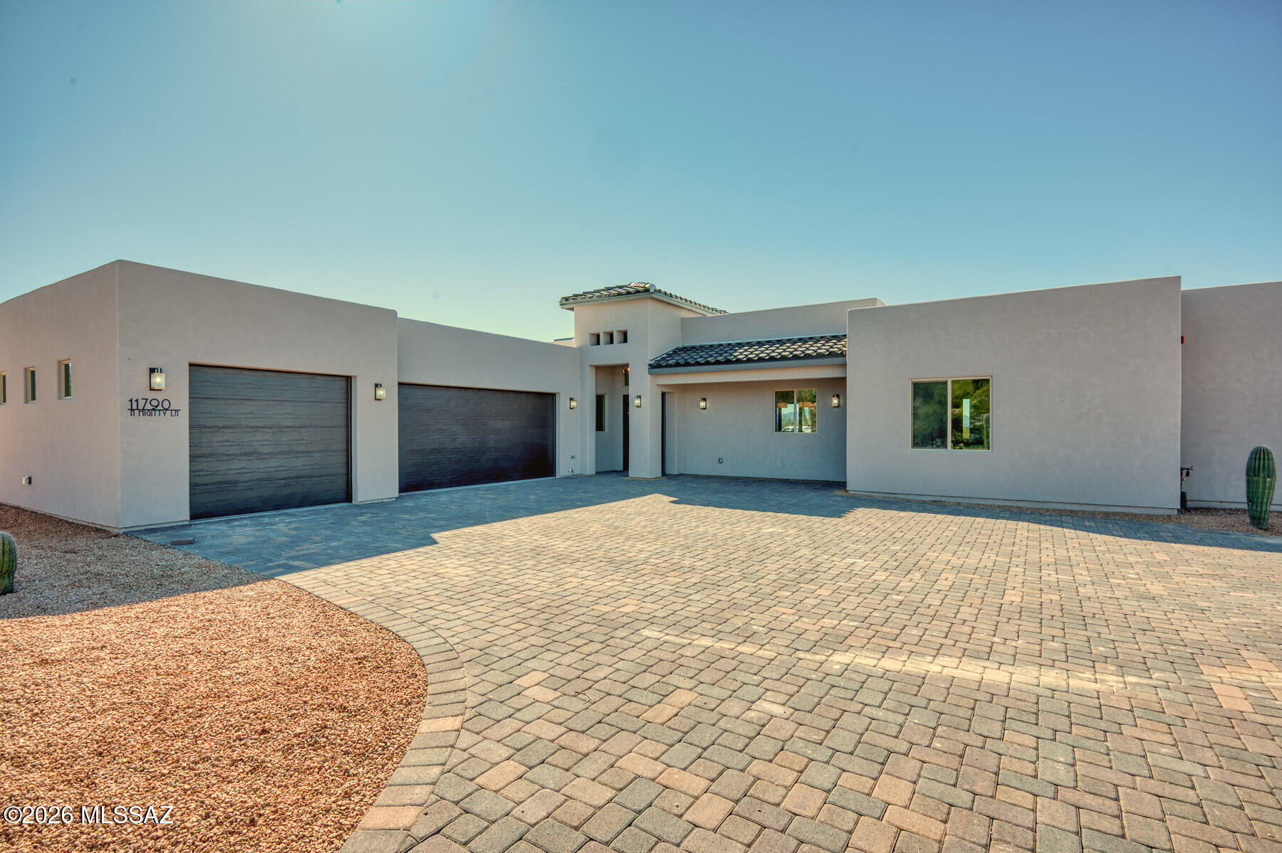 Discover a rare blend of modern living & land value.  This new 2640 sq ft home (4BD/5BA) sits on a premier 2.99-acre parcel zoned R-36, offering exceptional future lot-split potential (a plat may be required).  Enjoy panoramic desert views among iconic saguaros.  The great room features an 18-FT bifold door wall for seamless indoor-outdoor living.  This property combines luxury finishes with a smart investment in the Sonoran Desert.
