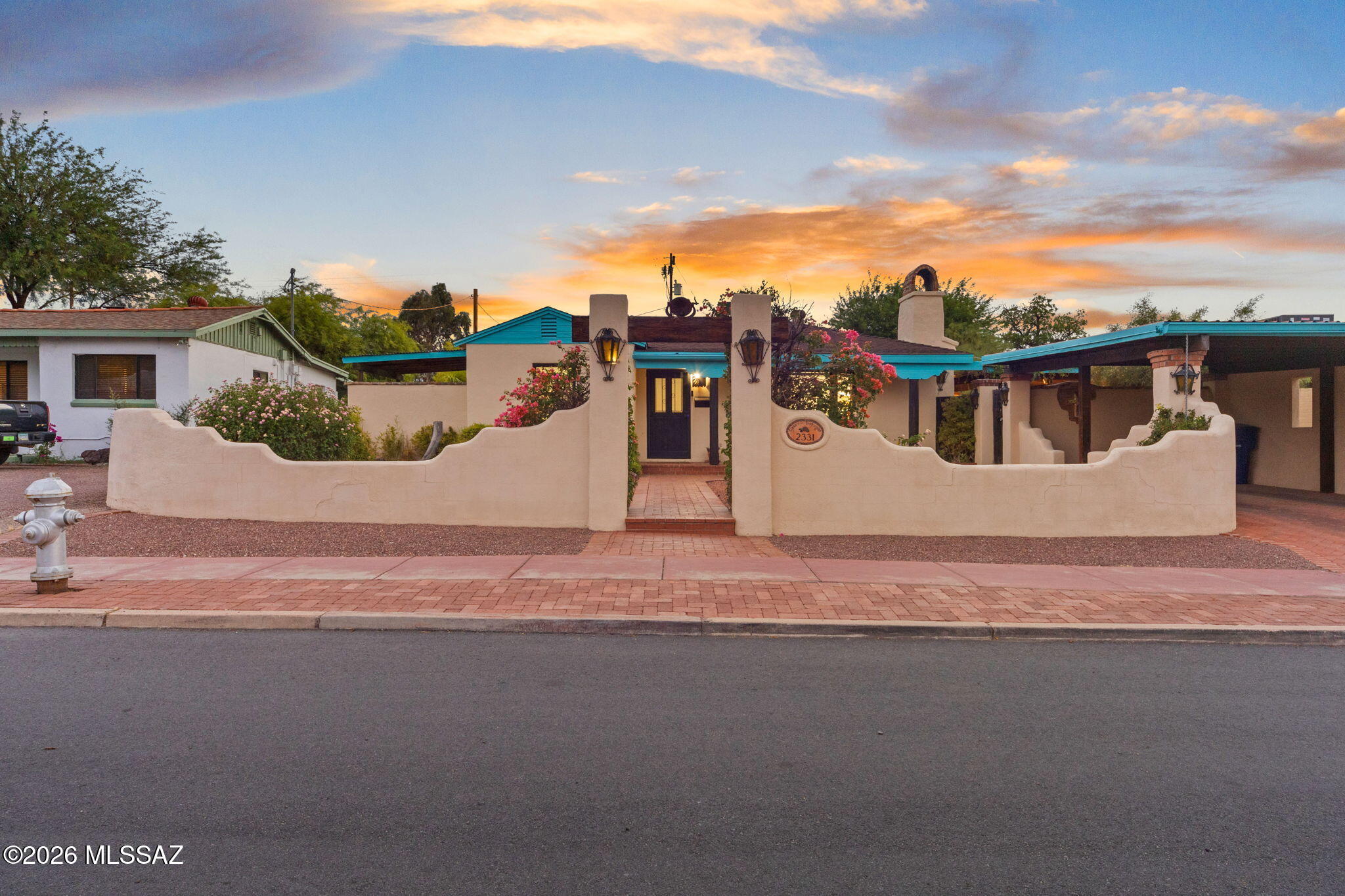 Tucson charm exudes from this home! From the moment you walk through the charming courtyard, inside to the remodeled yet comfortable spaces, and a magical backyard...you will say WOW!  Inside; 3 bedrooms & 3 bathrooms, a space for everyone! Exposed brick wall with fireplace, & Bright updated kitchen packs in all basic needs. Split bedroom floorplan with great sized rooms and access to backyard from 2/3 rooms. New AC (2024) Dual pane windows + Doors (2022) Tankless water heater (2022). Outside; Multiple covered patios, Pool/spa, Koi pond, Built in BBQ, sink and space to entertain. There is so much about this home that sets it apart from the rest! Nestled in Jefferson Park, this home is close to it all including UofA, Banner, Fine dining and so much more! Range Priced from $439,900-$459,900.