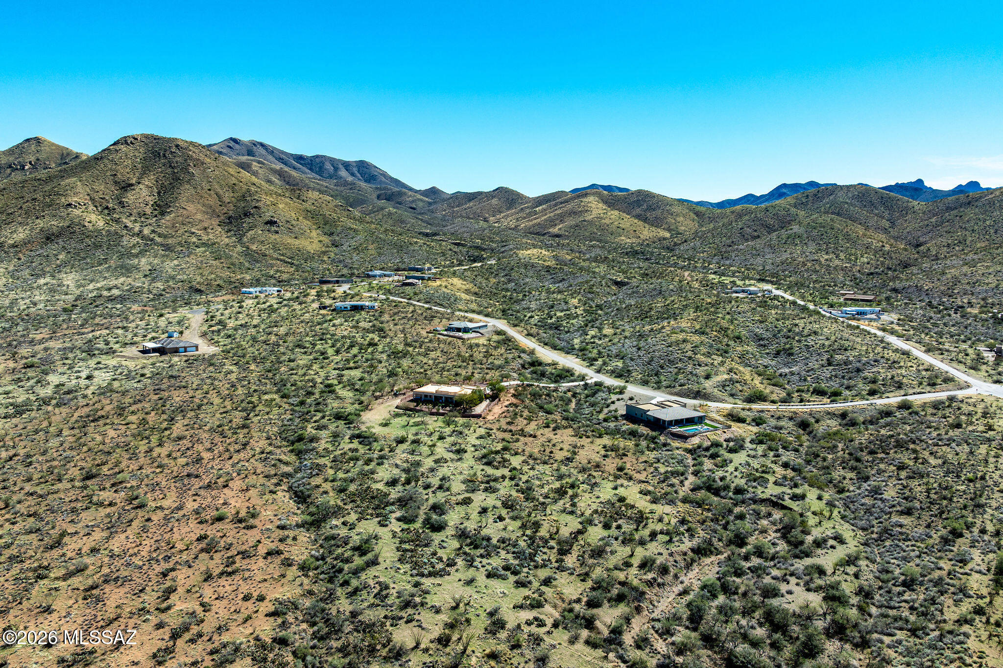 This remarkable home site is ready for you to build your dream home on!  This flat and easy to build lot already has Water, gas and electric at the driveway. The owner has also completed a soils report -saving you thousands of dollars and time!!!  Additional features include the eastern lot line bordering Federal land; paved streets; located at the end of a cul-de-sac street; utilities to the driveway; over 4 acres of land with forever views surrounding you including multiple mountain ranges such as the Rincon Mountains and the Santa Catalinas! Views stretch as far as Green Valley, Tucson, Sahuarita and Vail. You will enjoy sunrise and sunsets from your porch, stunning city lights and bright stars in the evenings! Call today for a tour of the land.