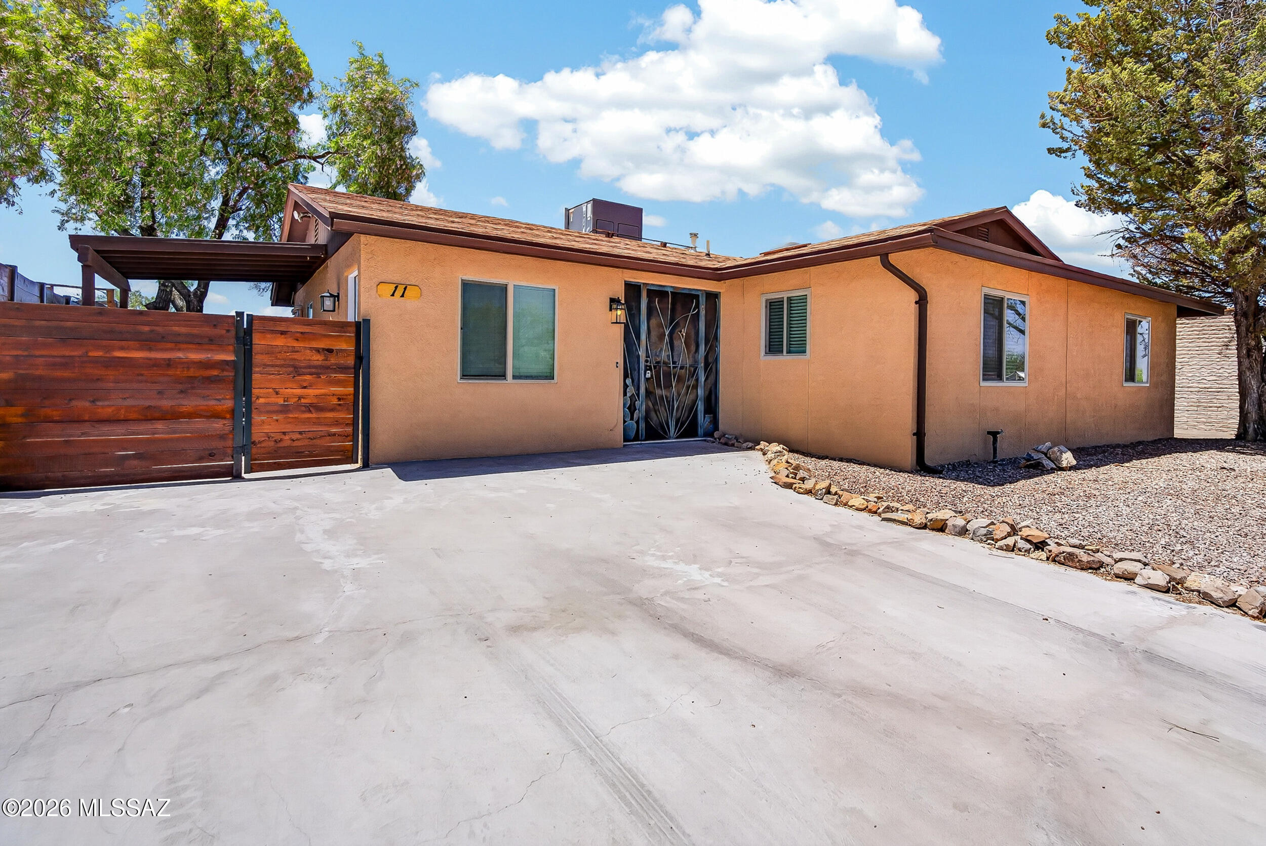 Move-in ready furnished retreat in Corona de Tucson - award-winning Vail School District, minutes from Raytheon, Davis-Monthan AFB & Tucson's top medical centers. Queen bed (primary suite, 2 walk-in closets) & full bed (guest room). Fresh linens & extra bedding included. Full cookware, dishes, silverware, coffee maker & toaster stocked. Granite counters, stainless appliances, gas stove & dishwasher. Tile/wood floors, carpeted bedrooms, ceiling fans throughout, faux wood blinds. In-unit W/D. Covered patio with unobstructed Santa Rita Mountain & desert views - sunsets & starry skies. Utilities (electric, gas, water), high-speed WiFi & trash included. Quick I-10 access -- 20 min to DMAFB, Raytheon, Banner UMC & TMC. Owner/Agent property. Tenant has exclusive use of all areas as described. Guest suite is inaccessible.