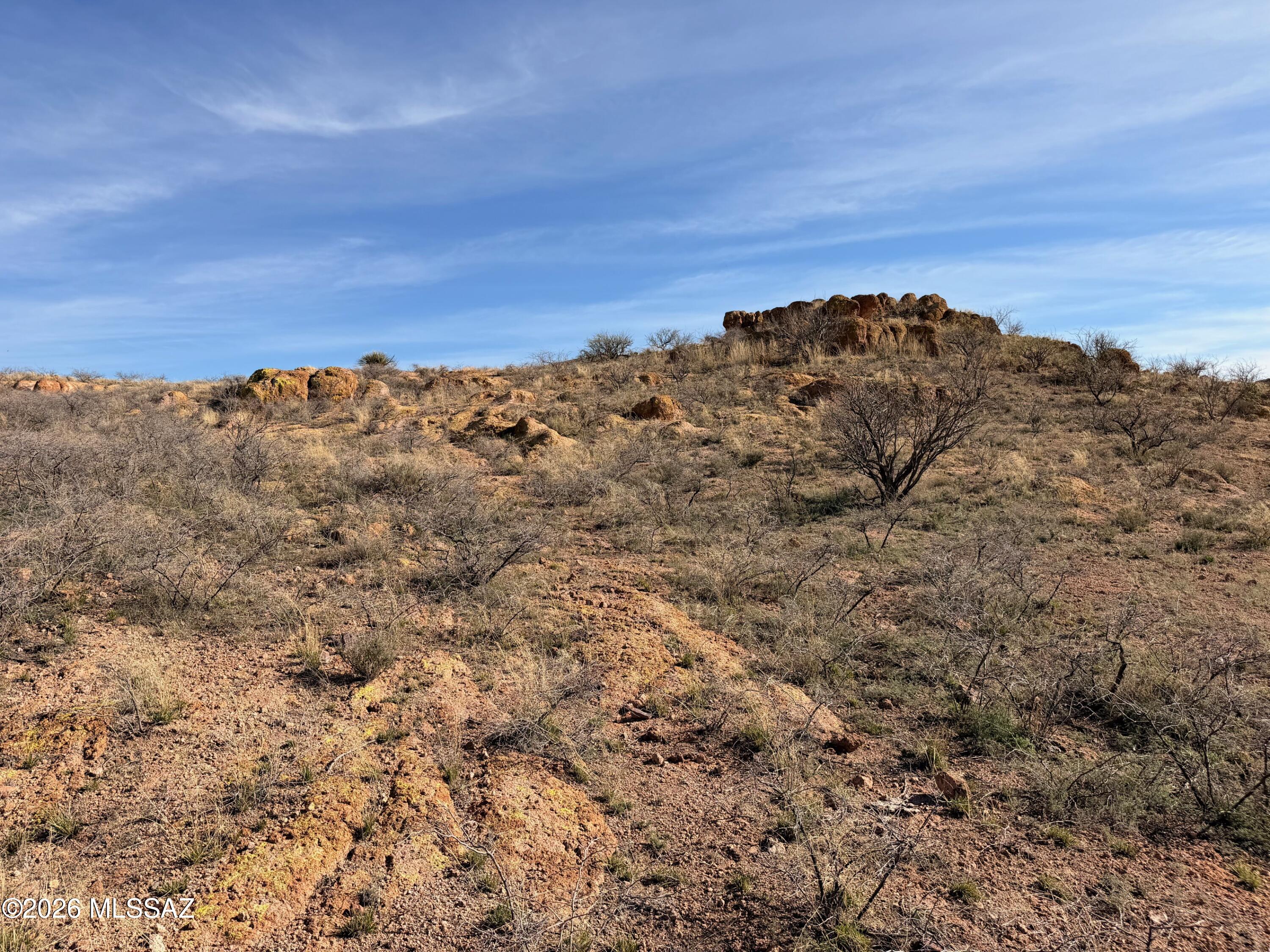 Here are 39.92 acres to enjoy your own private mountain and wake up to sweeping panoramic views, untouched high desert  and wildlife that roams freely through the land. Imagine sipping your morning coffee with nothing but peaceful, open land stretching in every direction. This  corner lot sits nestled between breathtaking hilltops with a  history as rich as the landscape itself, ground once traveled by the Apache Indians. It comes ready to build with power accessible on the north and west boundaries.