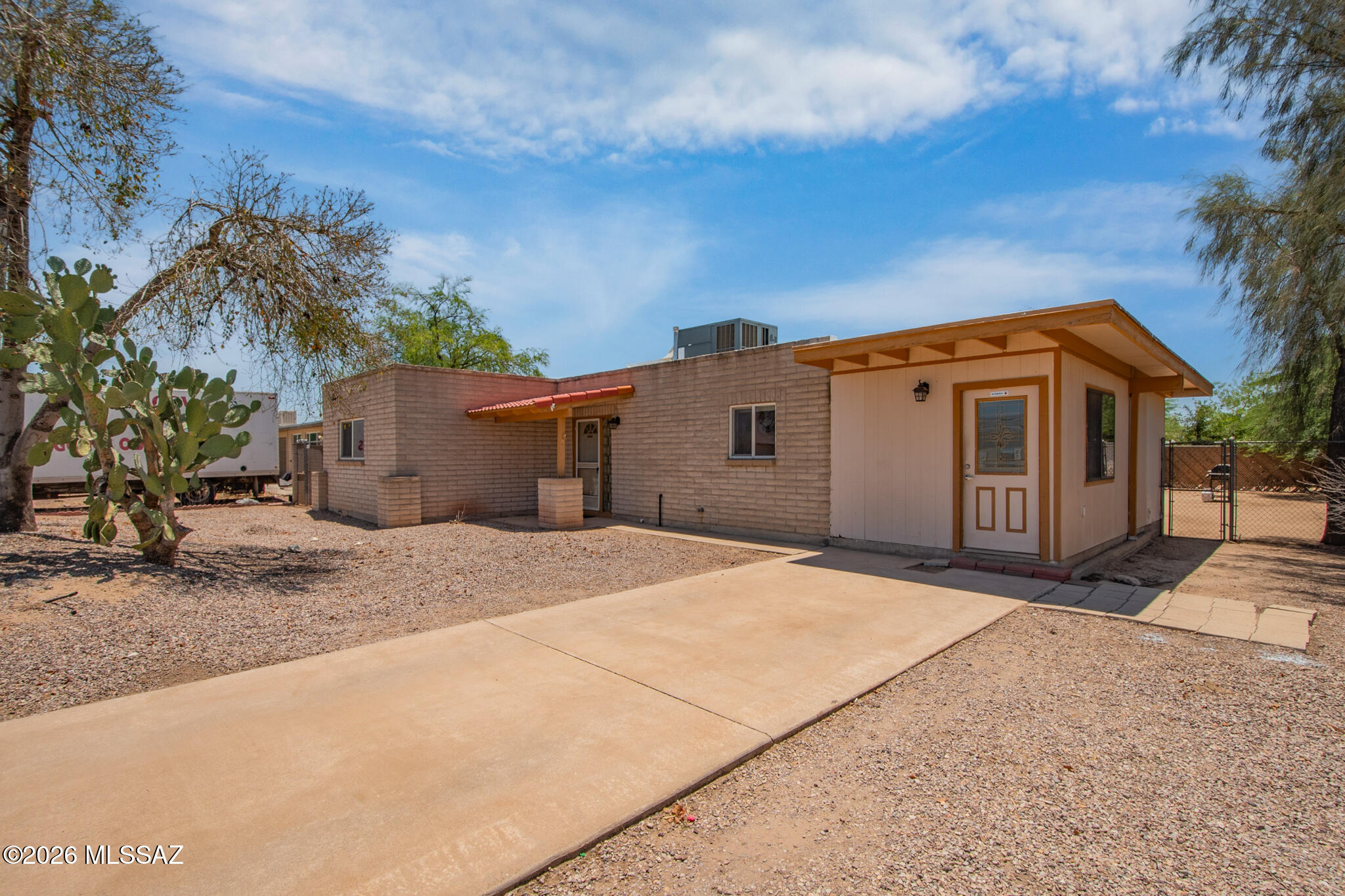 Welcome home to this spacious 4 bedroom, 2 bath residence offering 2,175 sq. ft. of versatile living space in desirable Northwest Tucson! Featuring a flexible floor plan with a bonus room, this home provides endless possibilities for a home office, playroom, gym, hobby space, or guest retreat.

Freshly painted throughout, the interior feels bright and open. The large eat-in kitchen offers abundant cabinetry and generous counter space, flowing seamlessly into the main living areas, perfect for everyday living and entertaining. A desirable split floor plan provides added privacy, while the oversized bedrooms offer plenty of space and comfort for family and guests alike Situated on a generously sized lot with low-maintenance desert landscaping, the property also features NO HOA, giving you the freedom to truly make it your own. Conveniently located near shopping, dining, schools, and easy access to everything Northwest Tucson has to offer, this home combines space, functionality, and value. Extra large shed stays! 
Priced to sell and ready for its next chapter, bring your highest and best offer!