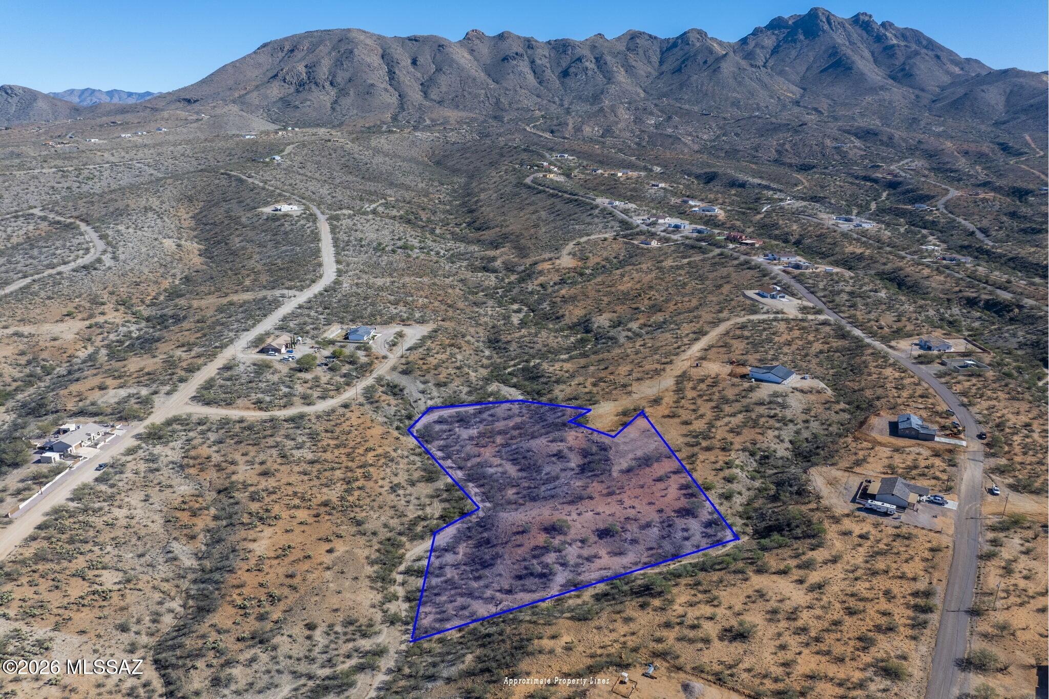 Discover the perfect opportunity to build your dream home in the beautiful Rio Rico Ranchettes. The spacious 4.97 acres of peaceful desert living. Nestled in a quiet cul-de-sac with scenic mountain views. The property provides ample space for a custom residence, guest home, or private retreat. Enjoy the serenity of Rio Rico's natural surroundings while remaining just a short drive from charming shops, art galleries, restaurants, and golf courses. Whether you're seeking a full-time residence or a seasonal getaway, this spacious double lot provides the ideal setting to bring your vision to life in one of southern Arizona's most picturesque communities.