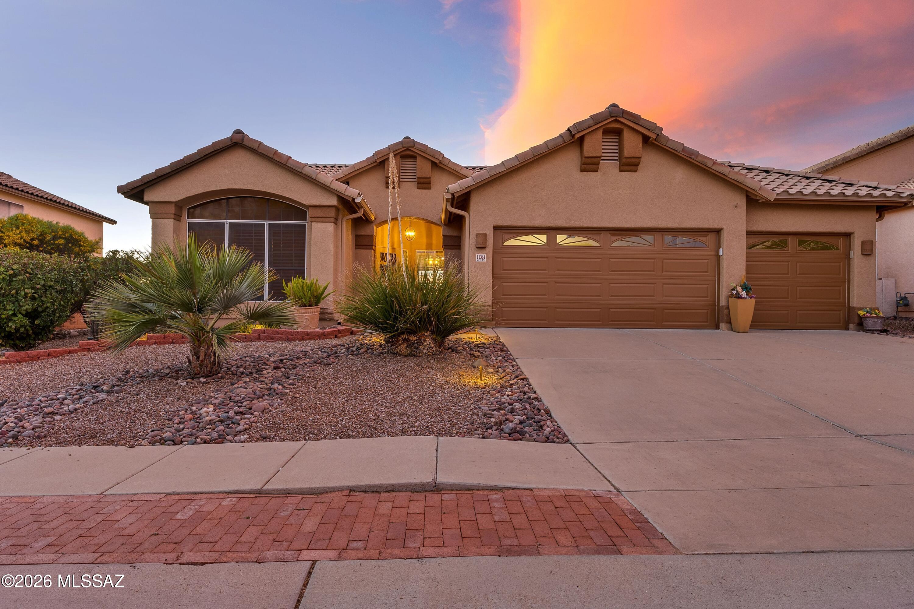 Located in the highly desirable Copper Creek community, this home is the definition of pride of ownership. Inside, updated luxury vinyl plank flooring and quartz kitchen countertops create a fresh, modern feel -- and the condition? Truly clean as a whistle. The kitchen features a breakfast bar and an eat-in dining area that opens to the family room, the heart of the home, complete with built-in cabinetry that adds both design and practical storage. A reverse osmosis system and whole-house water softener provide added comfort and quality behind the scenes. The split floorplan offers three bedrooms plus a versatile den with a closet that can easily serve as a fourth bedroom. In addition, the sellers added a bonus room currently used as a craft space. Step outside to a beautifully landscaped backyard situated on nearly a quarter-acre, where mountain views provide a stunning desert backdrop. Whether it's morning coffee or sunset skies, the setting feels distinctly Arizona. The three-car garage includes storage shelving, a workbench, and a utility sink. Meticulously maintained. Thoughtfully updated. Mountain views included. Welcome home.
Conveniently located near El Conquistador Golf Course, the Oro Valley Farmer's Market, shopping, dining, and everyday conveniences. And yes -- no poly pipes. Meticulously maintained. Thoughtfully updated. Mountain views included. Welcome home.