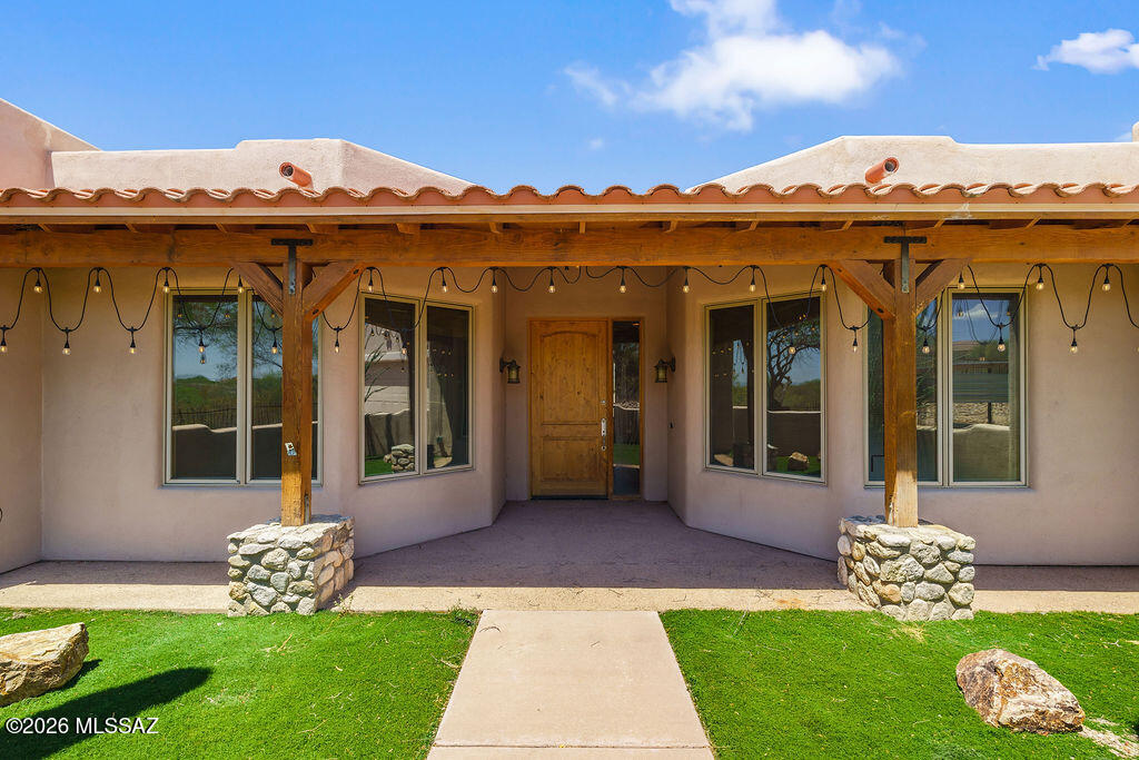 What a terrific opportunity!  This wonderful home is experiencing deferred maintenance & is looking for love.  The 3214 sq ft beauty on 3.48 acres is located in Santa Paula Ranch which lies within a larger tract of land formerly known as the Em Kay Arabian Horse Ranch.  This parcel is only 1 of 2 that is not located in the Conservation Easement that is believed to represent a prehistoric Hohokam Indian settlement.  The Buddy Greer built home needs a new roof, parapet repair, pool repairs, interior & exterior paint, etc. Beautiful interior wood detail.  Granite counters, Pella windows & doors, hickory cabinets, outdoor shower, huge pool & kicker views!!  Property is being sold AS IS w/no repairs being made.  Buyer encouraged to do own due diligence.  Come make this gorgeous home shine.
