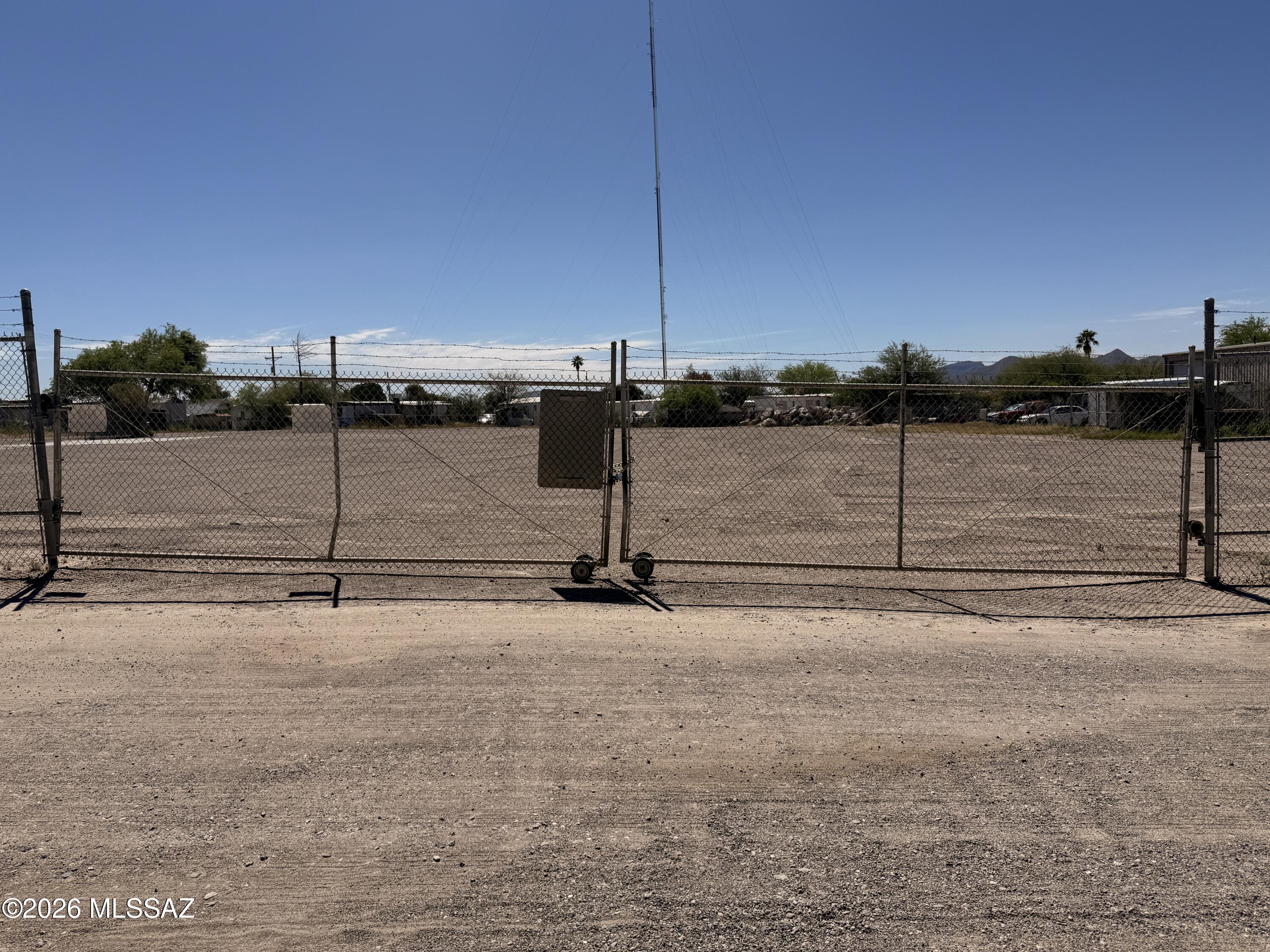 1.892 ac Secure Fully Fenced Industrial Yard + Office in Central/NW Tucson! Zoned Super Flexible MU can accommodate Industrial, Multi-Family, Office, Retail, and even Livestock!

Contractor-ready well maintained site featuring clean newer1,500+ SF manufactured office with 2 bathrooms, 3 offices, a front desk, & kitchenette, plus a fully usable yard with all utilities, gas, electric, water, and septic already in place. Secondary fenced area to secure or segregate important materials/machinery.

Designed for efficiency with easy truck circulation and ample space for equipment, fleet parking, or operations. Prime location about a mile from I-10 & only minutes from River Rd, offering strong access to the freeway and main arterials.

Opportunities like this are limited, come see it today!
