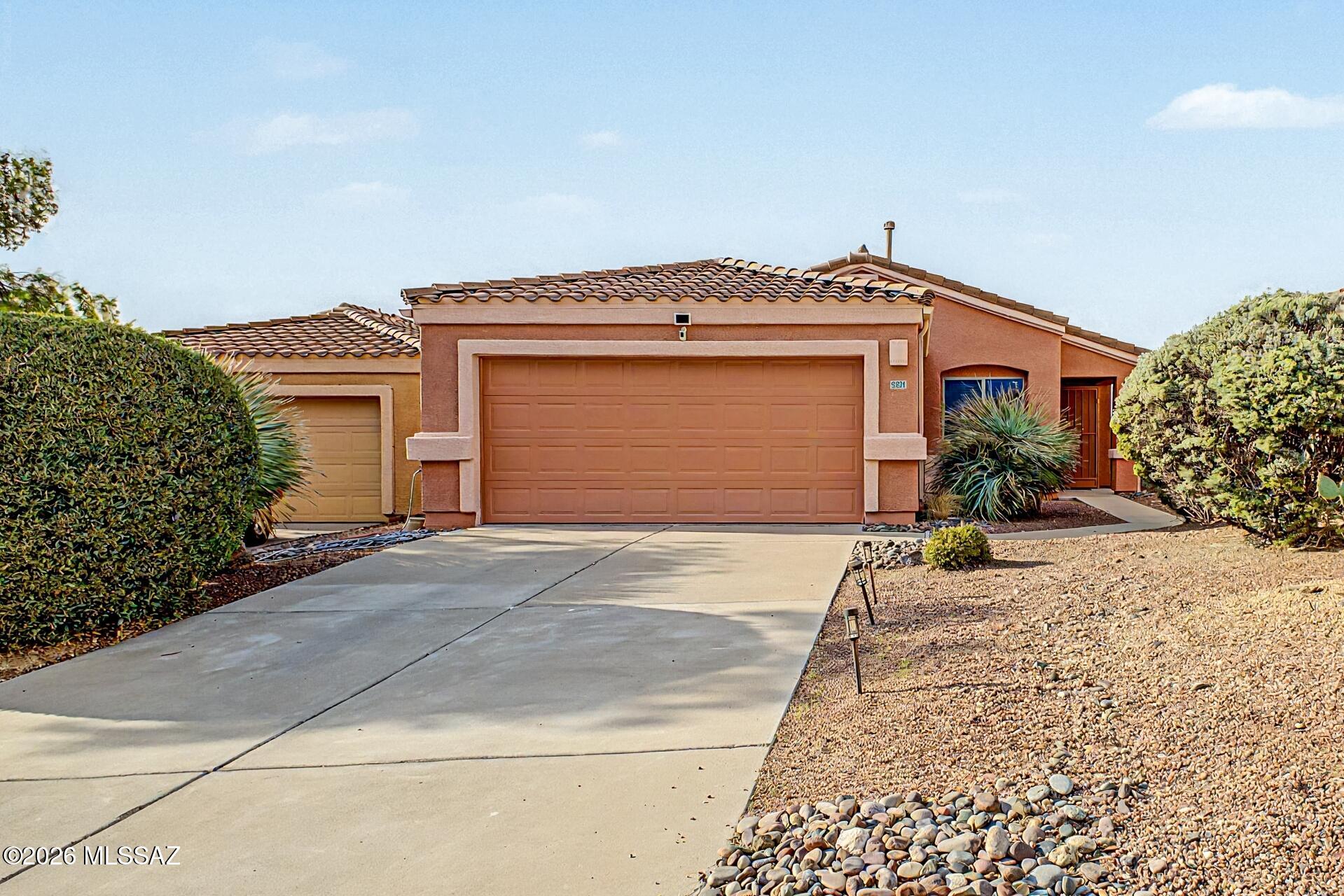 List Range Pricing, seller will accept or counter offers between $299,900 - $314,900 *** Nestled in a quiet, secluded neighborhood with just one entrance and two peaceful cul-de-sacs, this beautifully maintained 3-bedroom, 2-bath home offers privacy, comfort, and stunning natural surroundings. Backing to a common area and pristine desert, you'll enjoy breathtaking mountain views with no rear neighbors. Inside, wood and tile flooring flow throughout the home, creating a clean, low-maintenance living space. A newer HVAC system provides year-round comfort, while the backyard is designed for relaxation and entertaining with a private putting green and serene desert backdrop. Community is surrounded by open desert, this home offers the perfect blend of tranquility and convenience.