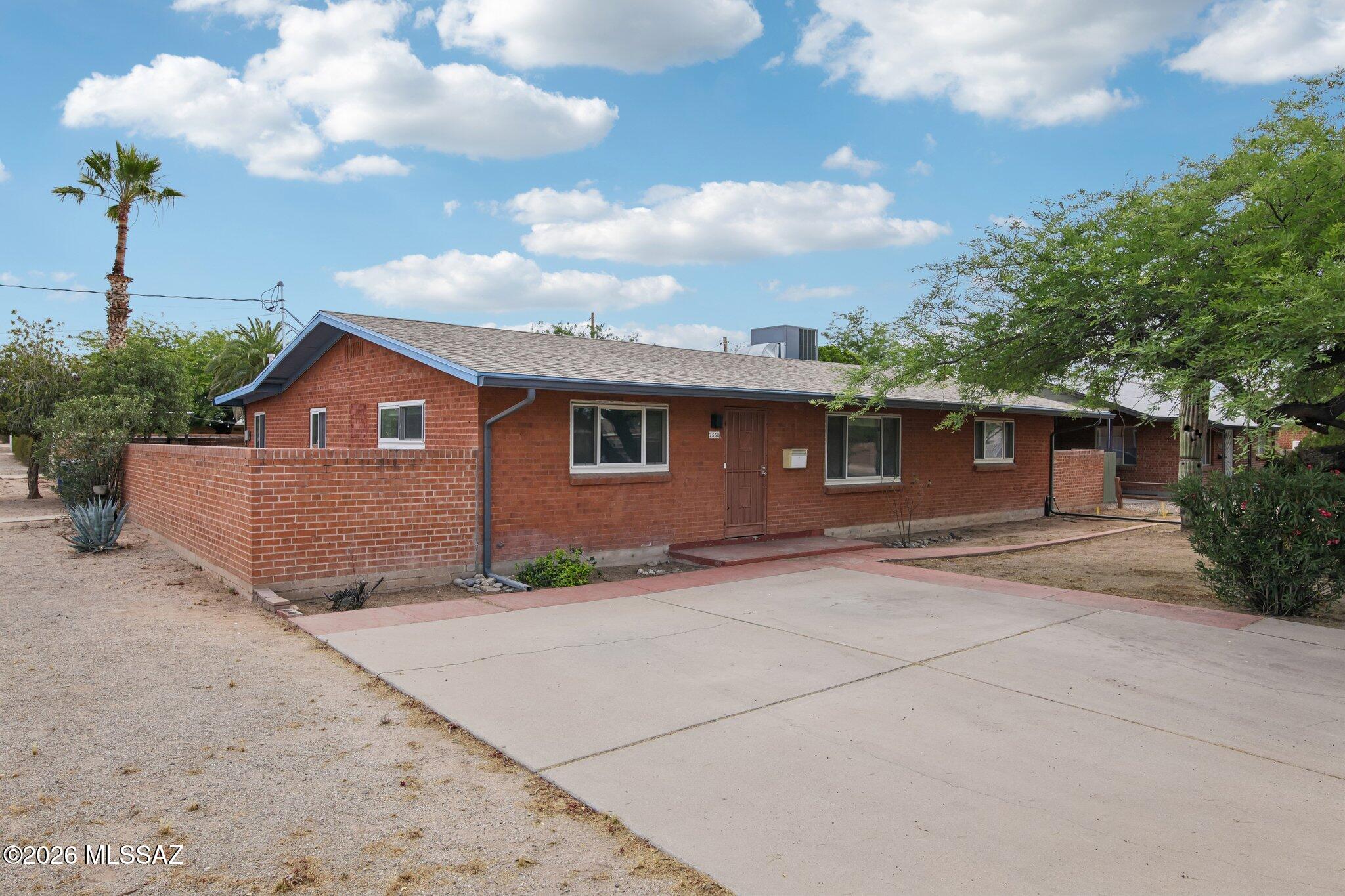 Spacious and open 4 bed, 2 bath w/ den Centrally located home on a corner lot. Unique open floor plan with a recently remodeled kitchen with an island, quartz countertops and SS gas appliances overlooking the pool area. Sizeable bedrooms; ceramic tile flooring throughout. Large pool with fenced area and gazebo; backyard with turf and pavers. Property has space for RV or additional parking with gate access. Convenient location; short distance to shopping, dining and parks.
