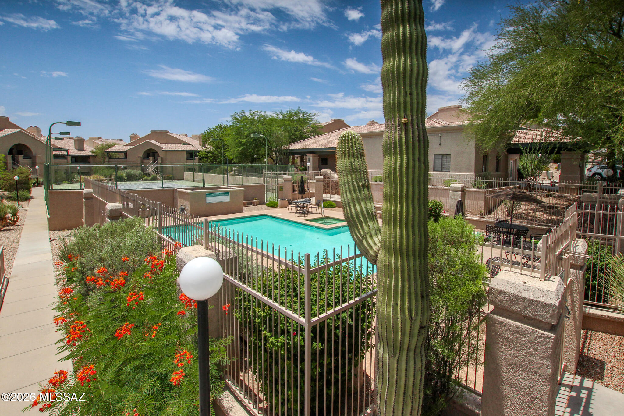 Experience resort-style living in this beautifully updated second-floor 2-bedroom, 2-bath condominium in the highly desirable Starr Pass area. This move-in-ready home features brand-new stainless steel appliances, a new HVAC system, beautiful  vinyl flooring, granite counters and an open, light-filled floor plan designed for easy living. private balcony and enjoy stunning city lights and mountain views, Ideally located just minutes from The U of A, Banner and Downtown Tucson, this property offers  convenience for students, medical professionals, UA staff, & anyone seeking quick access to Tucson's top destinations.Moonrise HOA covers exterior, roof, water, trash, pool, spa & gym. Starr Pass HOA adds golf, swimming, and JW Marriott dining discounts Ideally located just minutes from The University of Arizona, Banner - University Medical Center Tucson, Tucson Medical Center, and Downtown Tucson, this property offers exceptional convenience for students, medical professionals, university staff, and anyone seeking quick access to Tucson's top destinations.

Whether you're looking for a primary residence, a lock-and-leave second home, or an income-producing investment, this condo offers outstanding flexibility. Rental opportunities make it ideal for long-term leasing and, if permitted by the HOA and applicable local regulations, short-term vacation rentals. Its desirable location near the JW Marriott Tucson Starr Pass Resort & Spa, championship golf, luxury dining, hiking and biking trails, and resort amenities makes it especially attractive to tenants and visitors alike. Don't miss this opportunity to own an updated, low-maintenance property with spectacular views in one of Tucson's premier resort communities.