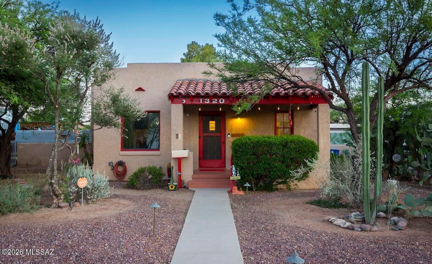 Enchanting 1937 bungalow with a newly REMODELED GUEST HOUSE in historic Jefferson Park, offering the character and walkable lifestyle that make this neighborhood so desirable. GORGEOUS WOOD FLOORS, high ceilings, and spacious rooms throughout. Ideal for first-time buyers, snowbirds, or a potential Airbnb investment.
The one-bedroom main house sits on a 9,000-square-foot lot with plenty of room for a pool, gardens, an additional ADU, or expanded outdoor entertaining spaces. The remodeled bathroom complements a kitchen with original cabinetry, stainless steel gas stove, stainless refrigerator, and added counter space.
The fully remodeled detached studio guest house offers exceptional flexibility as an artist's studio, private guest retreat, income-producing rental, or work-from-home space. The fully remodeled detached studio guest house offers exceptional flexibility as an artist's studio, private guest retreat, income-producing rental, or work-from-home space. Covered patios and a beautifully walled oversized yard create inviting outdoor living areas under the Arizona sky. Every space feels warm and authentic, blending historic charm with the relaxed desert lifestyle that defines Jefferson Park. A rare opportunity to own a piece of historic Tucson in one of the city's most sought-after central neighborhoods.