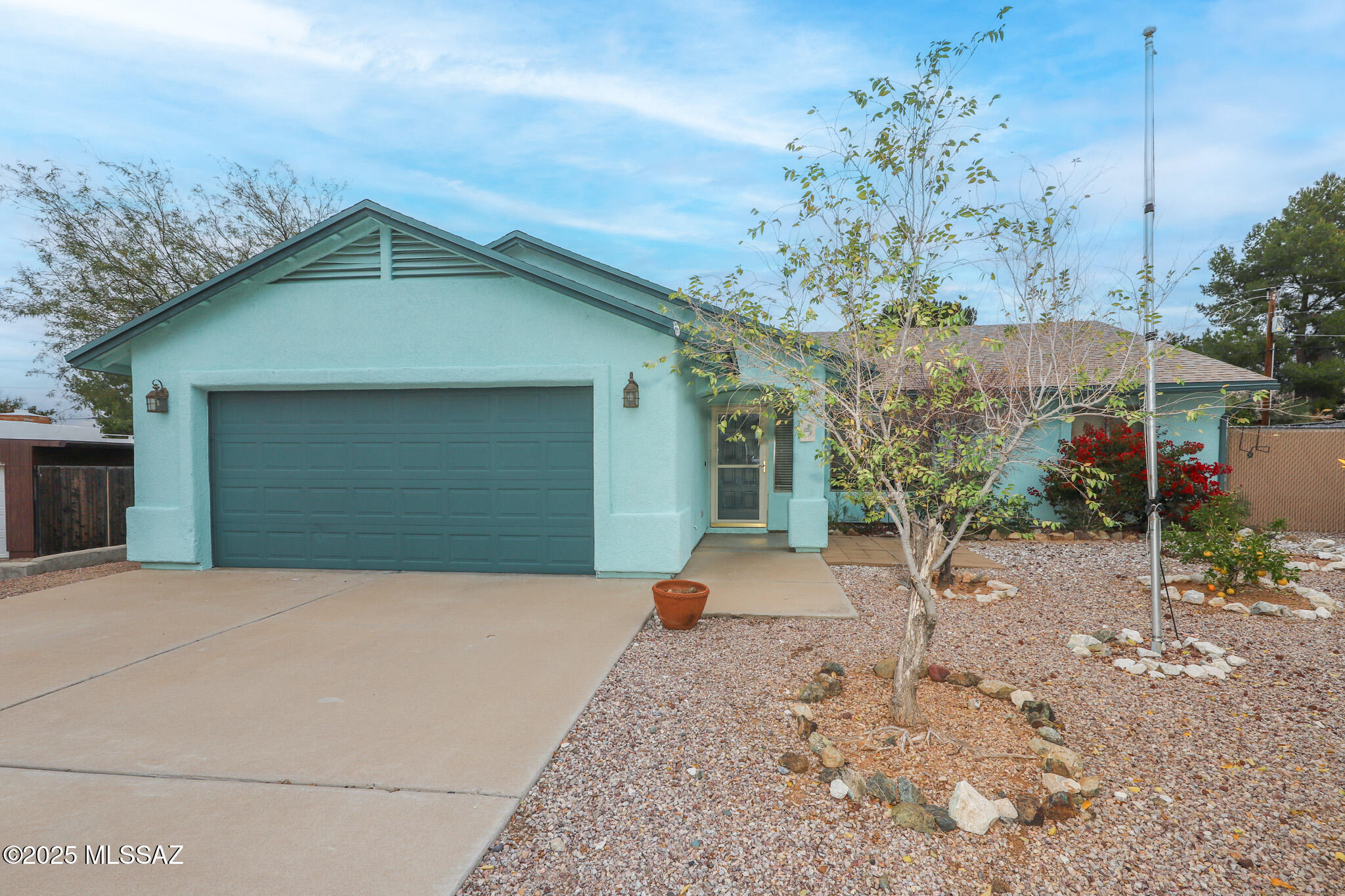 List Range Price- Seller will entertain offers between $275k-$300k MOTIVATED SELLER! GREAT OPPORTUNITY! 3 bed 2 bath Contemporary Home , Built in 2001, 2- car garage w/POOL & SPA!! Walk to elementary and middle schools Award winning VAIL SCHOOL DISTRICT, NO HOA , Large Lot w/ plenty of space for an RV or toys This immaculately cared for space is bright, open & Welcoming. Features vaulted ceilings, NEW ROOF 2018, HVAC (2015).  Vaulted ceilings, Screened in porch/ AZ room, Water Softener, Hot Water Heater 2020, Small fridge on porch stay. Washer/Dryer included, Freezer in Laundry room stays, Exterior recently painted & Main living areas painted 2025,  2 sheds convey. Spa heater not working & as-is .  Come take a tour and check out all this amazing property.
