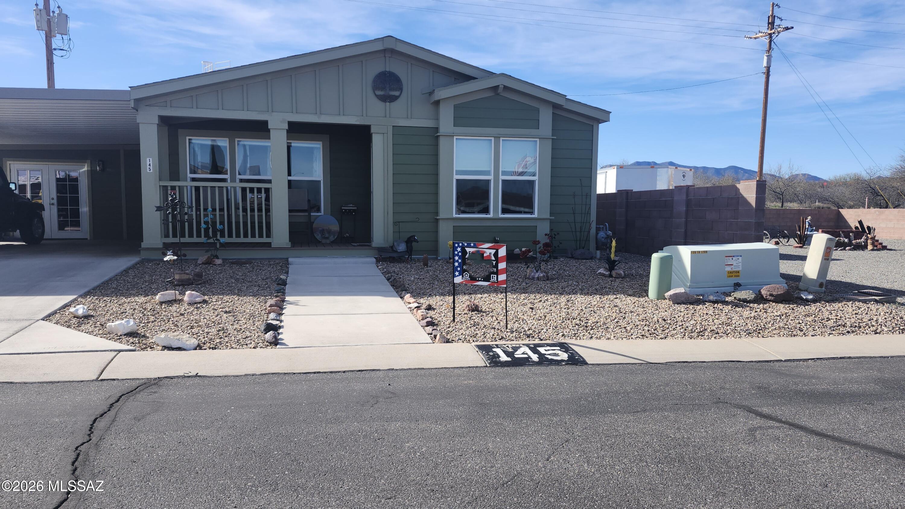 2018 Champion 2 bedroom 2 bath with a 2 car carport and finished shed complete with a mini split.
This listing is actually 1 lots being split from the 2nd lot. 
The interior was repainted in 2019 and the exterior painted in 2023. 
Since being new a diswasher, microwave and several new kitchen cabinets have been installed. 
The refrigerator, stove and kitchen sink are all new, The stove is currently electric however the gas line has been plumbed. 
There are many new upgrades that you need to see to appreciate.