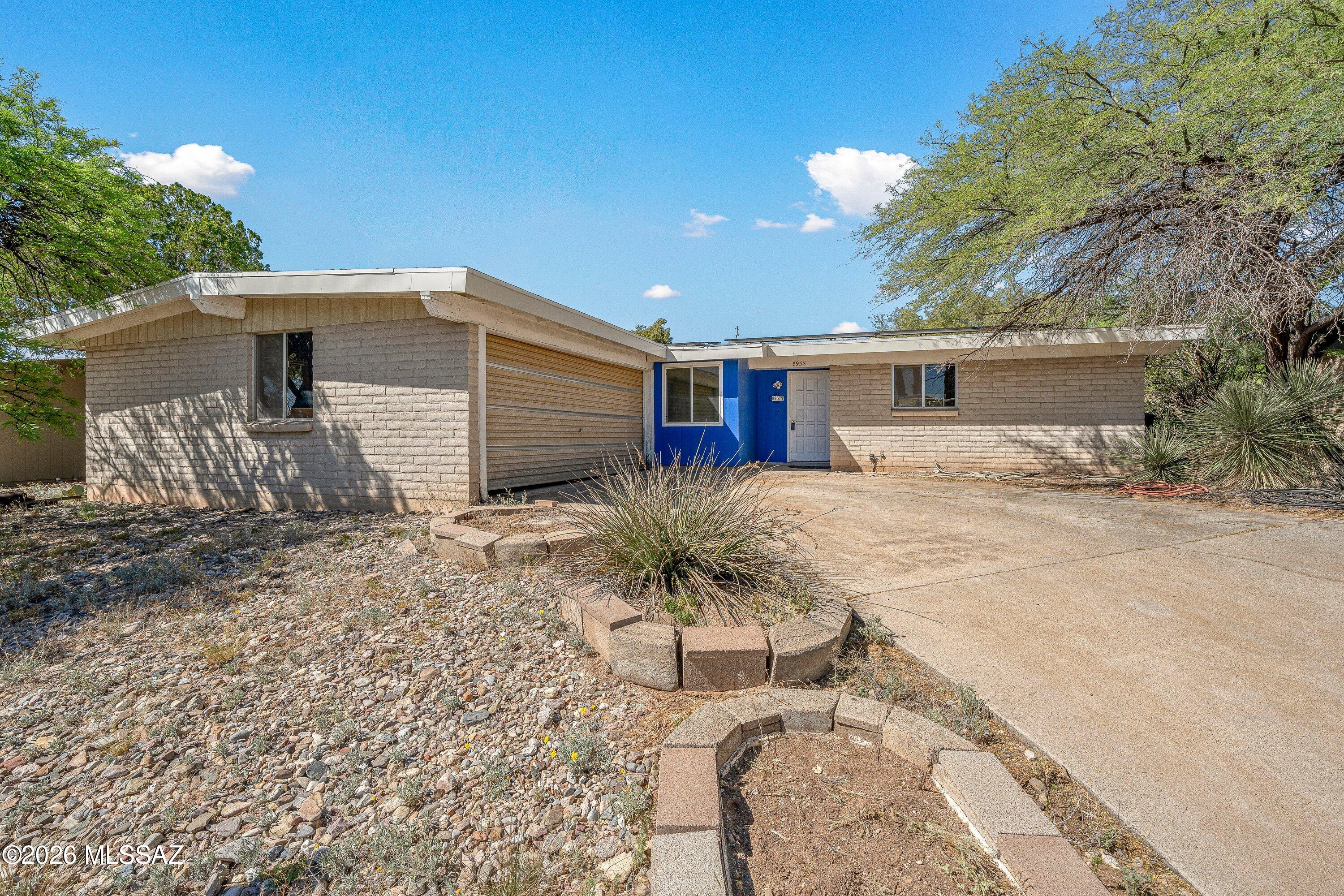 Great opportunity in the desirable east side of Tucson! This 4-bedroom, 2-bath home offers strong potential for investors or buyers looking to create their dream space. Featuring owned solar for energy efficiency and a newer HVAC system for added comfort and value, the major components are already in place. The home does need updates and repairs, making it an ideal fix-up opportunity with room to build equity. Spacious layout, solid bones and a large lot. Conveniently located near shopping and dining at Park Place Mall, close to schools including Tucson Unified School District, and just minutes from Rolling Hills Golf Course. Enjoy easy access to outdoor recreation with nearby hiking and biking at Saguaro National Park East.