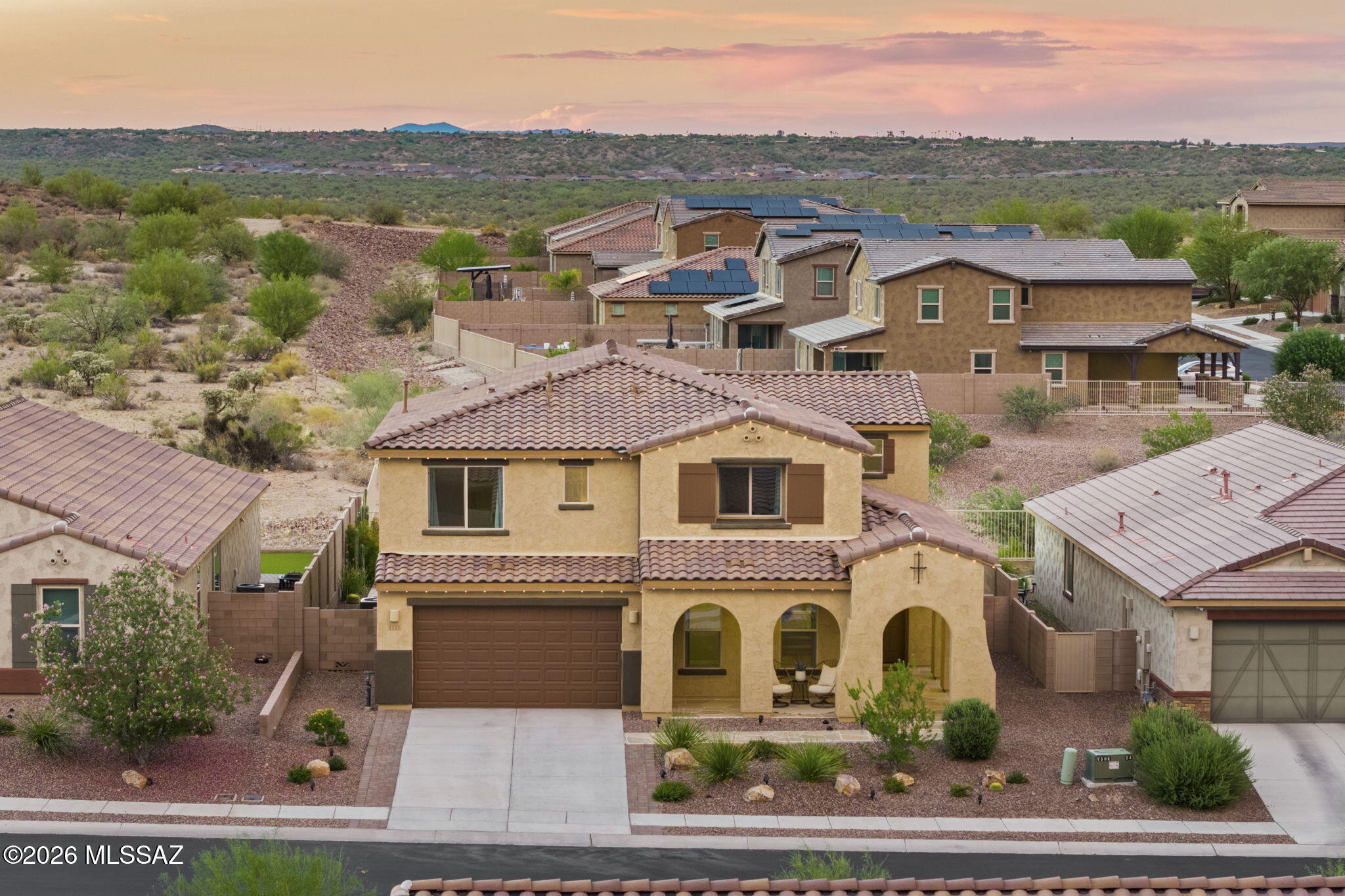 From the moment you drive through the gates of the upscale gated community, you'll know you're Home. This stunning turn-key 4BR 3.5 BA in the heart of Oro Valley,designed for effortless living and entertaining, framed by breathtaking Catalina Mountain Views from nearly every room.
The Gourmet kitchen is a chefs dream, boasting a massive central island, quartz counters, top-of-the-line appliances including full size double ovens, and exceptional storage. Flowing seamlessly into the generous dining area and spacious living room,  creating a welcoming environment for gatherings large and small.
Highly versatile flex spaces include a large front room( perfect for formal dining room,  theater, or game room), two home offices, and an upstairs loft ideal for playroom or teen hangout. Rest easy the 4 spacious bedrooms each highlighting the stunning mountain backdrops. Thoughtful upgrades feature brand new carpet on the second level, designer powder room, and luxurious primary bath. outside Outside boasts a custom-finished portico  and permanent Trimlight Lighting for year round ambient and holiday illumination. The elegance continues with a 16' x 32' pool featuring programmable lighting and waterfall, while two generous travertine patios offer front-row seats to our dramatic sunsets. Just minutes from shopping, dining, and outdoor recreation. The Villages at Silverhawke feature manicured common areas, including two playgrounds, basketball court, cover picnic pavilions, with  views from everyvantage. Beautifully maintained, thoughfully upgraded, and perfectly situated, This Home Is Ready To Welcome You!!!