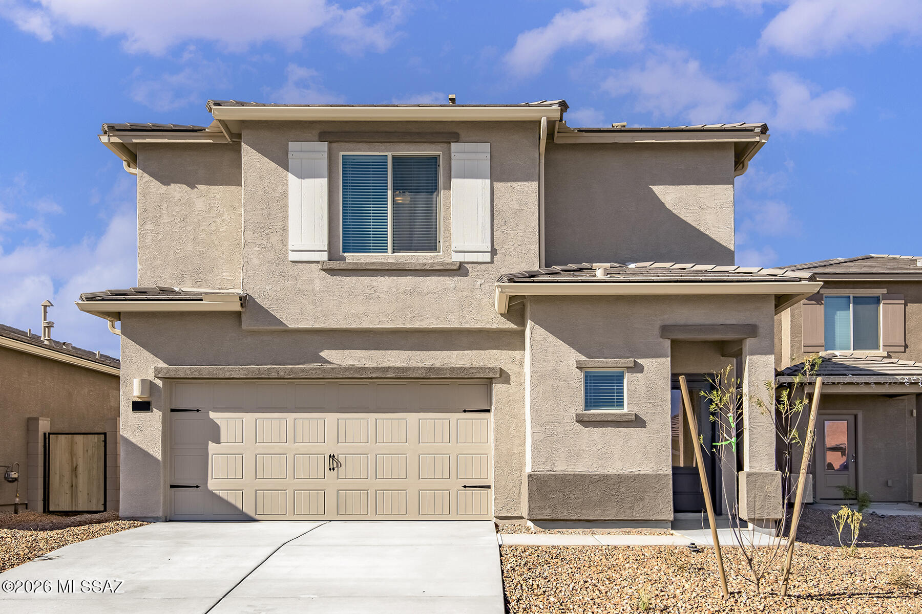 Two-story home with an open floor plan that boasts 4 bedrooms and 2.5 baths located in Star Valley. Features a spacious master suite with a generous walk-in closet, an upstairs tech area, a convenient laundry room, three additional roomy bedrooms, and a second full bath with dual bathtub and shower. Offers an array of upgrades, including energy-efficient kitchen appliances, front yard landscaping, and an attached two-car garage. The heart of this home is the chef-ready kitchen that showcases beautiful quartz countertops, wood cabinetry with crown molding, and recessed lighting, making it the stunning centerpiece of the home. 
The master bedroom easily accommodates king-sized furniture & features an incredible attached master bathroom and a walk-in closet, offering a personal sanctuary.