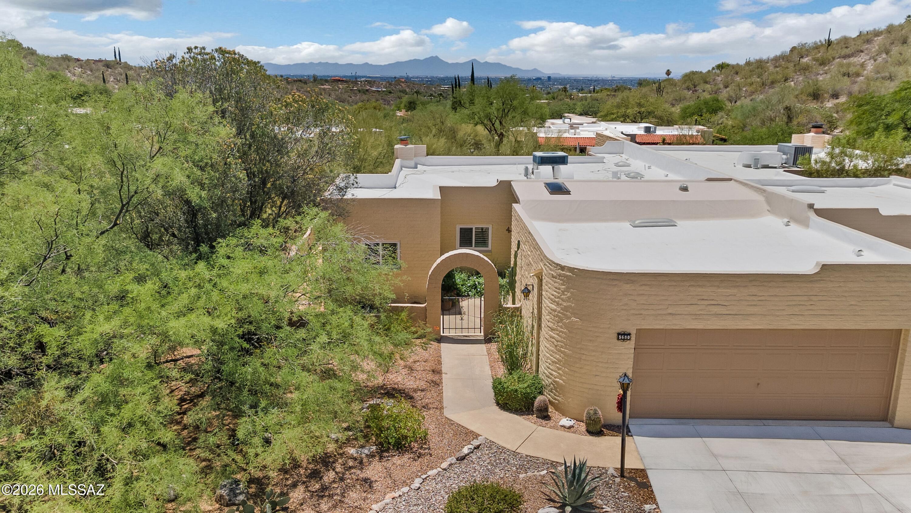 Located in the highly sought-after Catalina Foothills, this beautifully renovated 2-bedroom, 2-bath townhome in the desirable Sunrise Presidio Townhomes offers the perfect blend of comfort, style, and privacy. Meticulously maintained and thoughtfully updated in 2021, this 1,621 sq. ft. home features modern finishes, spacious living areas, and a functional floor plan designed for easy living.
Enjoy peace and privacy while taking advantage of the community's outstanding amenities, including a sparkling swimming pool, pickleball courts, and tennis courts. Major updates provide added peace of mind, including a new roof in 2020 and water heater replaced in 2023. With low HOA dues of just $110 per month, residents enjoy a well-maintained community in one of Tucson's most desirable locations, just minutes from premier shopping, dining, golf, and hiking trails. This move-in-ready Foothills gem is a rare opportunity you won't want to miss.