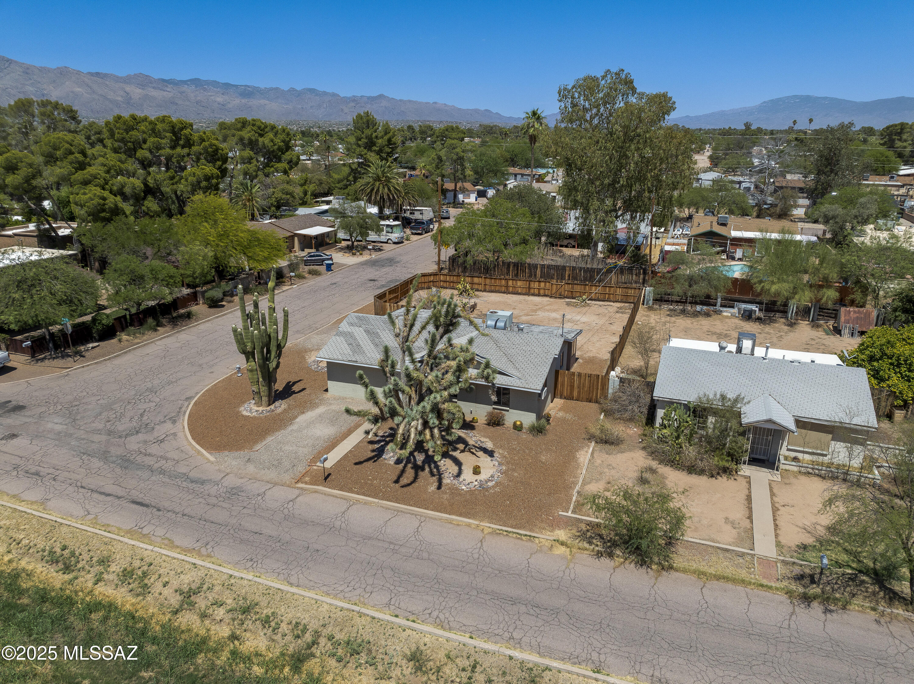 *New roof installed as of 8/15/2025.* First time on the market! This 1951 mid-century gem has been owned by one family since it was built. Situated on a huge corner lot in a charming central Tucson neighborhood, this 3-bed, 2-bath home offers incredible potential. With tons of curb appeal and plenty of space for an ADU/casita and a pool, it's an ideal opportunity for investors or handy buyers. The location can't be beat—just a 5-minute drive to Banner, 7 minutes to the UofA, and within walking distance to restaurants and coffee shops. AS IS Estate Sale priced at appraised value!
