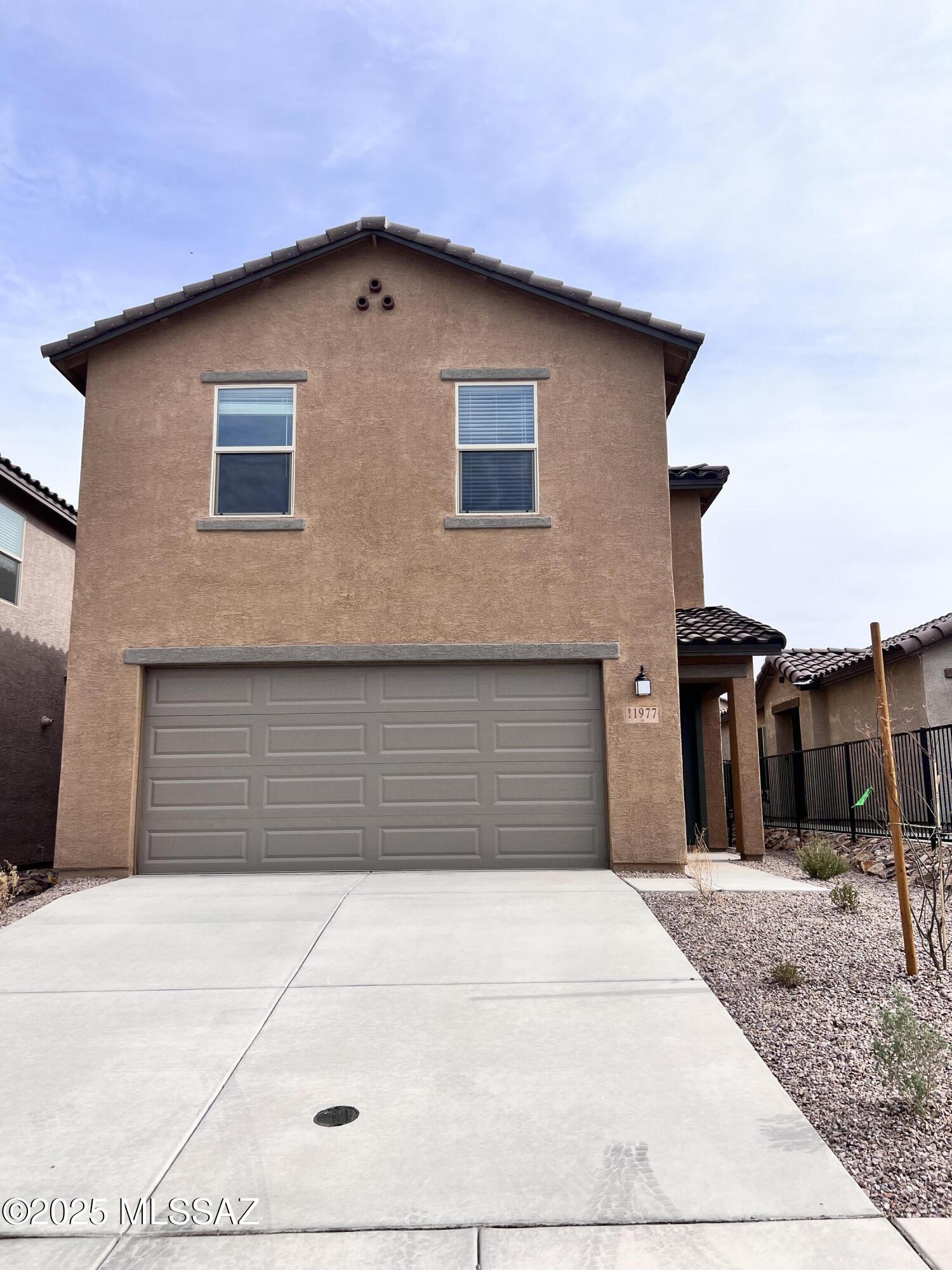 Beautiful 2024 Home in Vail at Hanson Ridge! Kitchen features stainless steel appliances, island, walk-in pantry and great storage and counter space. 1/2 bath downstairs and coat closet. Spacious Loft has loads of potential! Primary bedroom w/ensuite offers dual vanities and walk-in shower. Fenced backyard w/artificial turf and pavers, ceiling fans, two car garage and more!