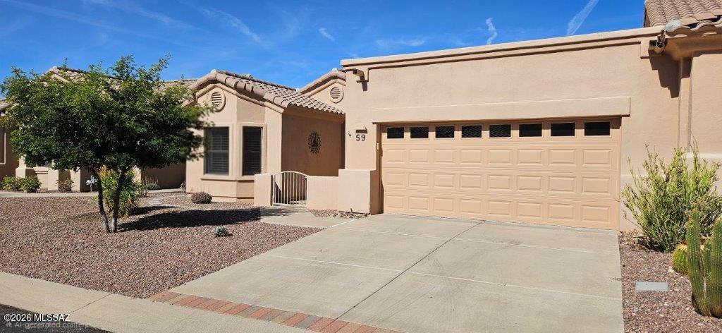 Retire in Style!

2-bedroom plus den/office, 2 bath townhome/condo with NEW ROOF April 2026 in Vistoso Village Unit #59, the largest floorplan available! 1,851 sq ft.

Monthly HOA fee includes water, roof, exterior paint, all exterior maintenance front and rear, Xfinity cable tv, termite treatment, year-round heated community pool. spa and lap pool, clubhouse, hobby activities, barbeque grills and more! 

Street maintenance, Brush and Bulky pickup and more!  

This is a lock and leave, gated, adult 55 and older community. Secure, safe and quiet! Spotless and move in ready. TV in master BR stays as does two bar stools. Solar tube lights in great room and laundry. YOUR NEXT CHAPTER BEGINS IN A WELCOMING, VIBRANT COMMUNITY DEDICATED TO MAKING LIFE FUN, FULFILLING ANDFULL OF OPPORTUNITIES! 

VISTOSO VILLAGE: A VIBRANT 55+ACTIVE ADULT COMMUNITY
Located in picturesque Oro Valley, Vistoso Village is an intimate, lock-and-leave gated community offering an unparalleled living experience for active adults.  With just 263 homes, and 5 different appealing models, our residents enjoy a peaceful, private setting with the opportunity to participate in a variety of engaging activities. Vistoso Village fosters a vibrant, friendly atmosphere where residents can connect, create and thrive!


This pristine home, located in gated, age restricted, well-manicured, very desirable Vistoso Village in Oro Valley. This property, 1,851 sq ft home, the largest floorplan, rarely available, has two bedrooms with den/office, two bathrooms and a spacious bright, open great room. Looking out from the kitchen, you can enjoy family and guests as you prepare a meal.

Enjoy fresh air and quiet splendor in the entry courtyard. The home has vaulted ceilings, large windows with Plantation Shutters, neutral tile combined with a breakfast nook and bar!

Granite countertops throughout, even in the laundry room with a utility sink, make laundry day a snap.

The rear covered patio with a shade awning, remote and a ceiling fan, make relishing patio time a priority. Garage has built-in-storage cabinets.

The HOA monthly fee of $524, includes water, a community lap pool, regular pool, spa and hot tub, clubhouse, exterior maintenance, recreation room library, termite treatment every five years.

ON-SITE MANAGEMENT STAFF

HEATED RECREATION & LAP

POOLS and HOT TUB 

SHADED OUTDOOR SEATING WITH PROPANE GRILLS

CLUBHOUSE WITH MULTI FUNCTIONAL SPACES   

FITNESS CENTER WITH SHOWERS

CARD/CRAFTS ROOM

LIBRARY

BILLIARDS/TABLE TENNIS ROOM

EXPANSIVE PARTY/DINING ROOM 

FULL KITCHEN FACILITIES

MEDIA ROOM WITH EXTRA LARGE SCREEN TV

EXTENSIVE HOA SERVICES:

IN ADDITION TO ALL OF OUR TOP-NOTCH FACILITIES, AMENITIES AND DAILY ON-SITE PROFESSIONAL MANAGEMENT! 

OUR MONTHLY HOA FEES CURRENTLY
INCLUDE: 

ROOF REPAIR/REPLACEMENT 

RANCHO VISTOSO RECREATIONAL OUTDOOR FACILITIES 

HOME EXTERIOR PAINT 

XFINITY INTERNET/TV CABLE

PROFESSIONAL LANDSCAPING-YARDS AND COMMUNITY SPACES

COMPREHENSIVE EXTERIOR FEATURES

INSECT/PEST CONTROL 

STREET MAINTENANCE AND REPAIR

WATER AND SEWER

TRASH/RECYCLING PLUS BULK PICKUP

EVEN MORE!!!!

COMMUNITY SPIRIT & ACTIVITIES: 
Exercise and social events, currently
including: 
Aerobics and Water Aerobics
Games such as Mexican Train,
Mahjongg, Cornhole & Poker
Pickleball Club 
Yoga
Billiards/Table Tennis 
Book Club
Line Dancing 
Handcrafters Group
Golf Leagues
Hiking Groups
Concerts/Speakers 
Walking/Museum Tours
Friday Social Hour 
Village Newsletter
Community Website  
Men's Breakfast Group
Women's Breakfast Group 
Annual Community Events such as the
Pet Parade, St. Patrick's Day Party, Spring
Luncheon, Soup & Chili Cook-Off,
Halloween Happy Hour, Thanksgiving
Dinner, Christmas Caroling and our New
Year's Eve Gala
Seasonal Village Breakfasts
Planned AND Impromptu Pool Parties
Summer Survivor Pop-up Events