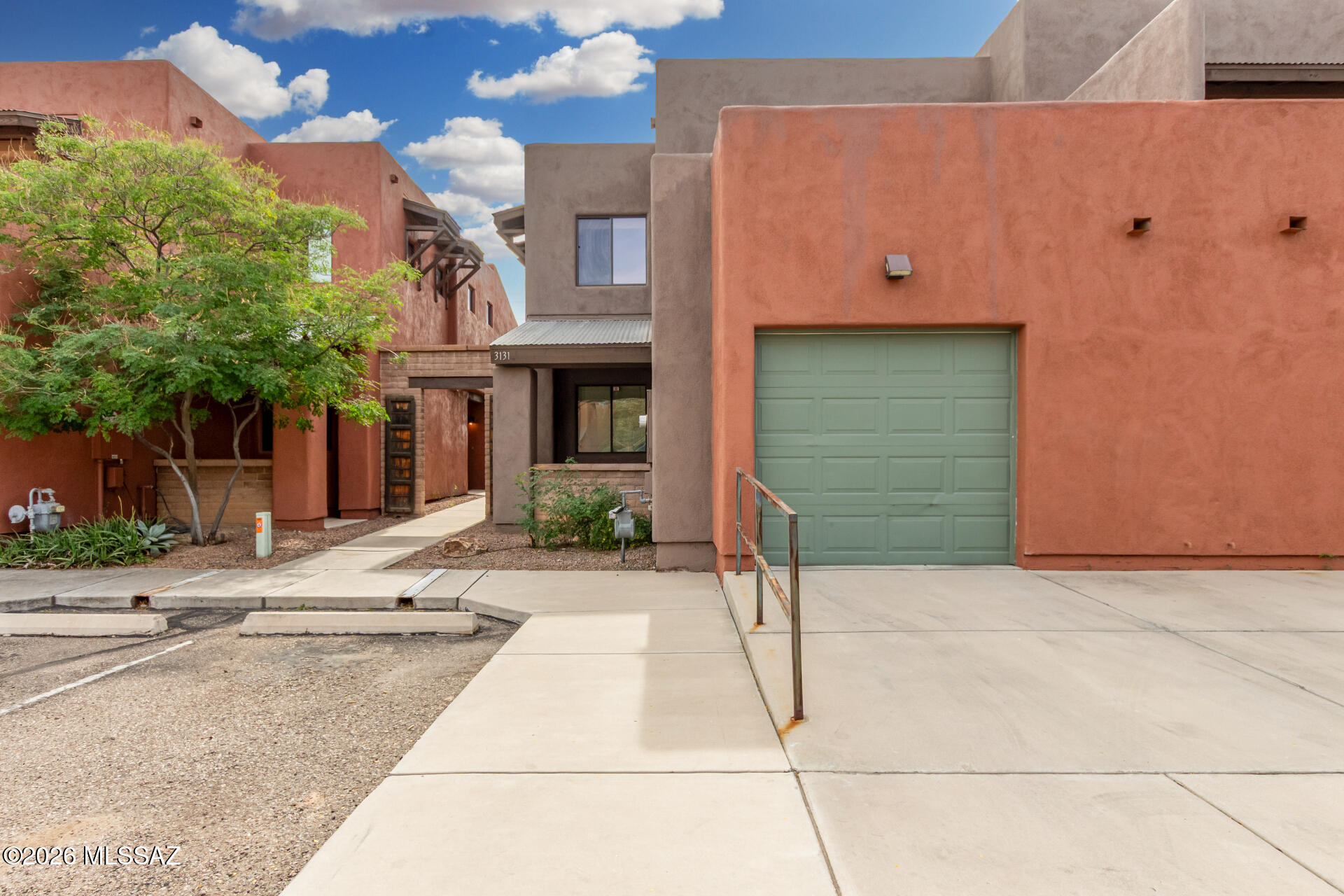 Spacious 3 bedroom and 3 bath Townhome in Central Tucson minutes away from U of A and downtown. Main level is an open floor plan with a bedroom and  bathroom downstairs. Double doors open to a nicely covered back patio. Upstairs provides a loft, a primary bedroom with a private patio, and 3rd bedroom. Home comes with a single car garage. Call today to schedule a showing.