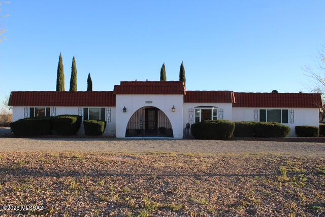 ANOTHER BIG PRICE REDUCTION!!! Beautiful, spacious, 3bd, 2ba home with lovely views and easy access to Interstate 10 and the city of Willcox. This very nice house has been updated and so well taken care of that it feels like a new home!  New appliances in the kitchen, lovely wood beams on the ceiling in the living room and dining room area. It sits on 5 usable acres and with paved access, and a short distance to Interstate 10, so it's convenient to wherever you need to go! Sit on your back porch and enjoy your beautiful lawn with irrigation system and fenced-in yard, while you enjoy the spectacular Arizona sunsets! Nice large workshop, chicken pen, and plenty of room for all your barnyard friends! This is a super nice home in the country, and you don't want to miss this opportunity!!