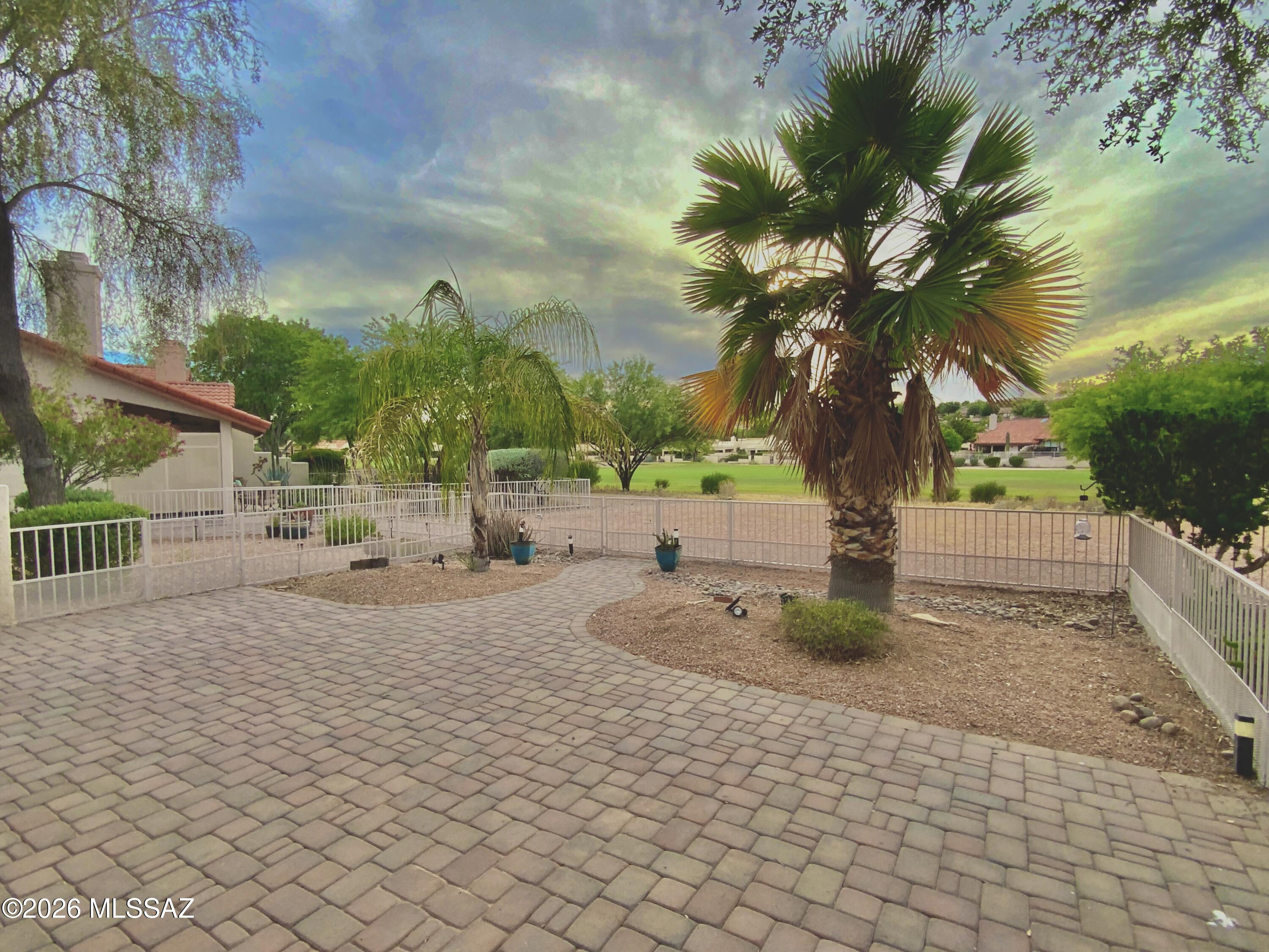 Welcome to this beautifully updated 2BD/2BA TH in the highly sought after Tucson National community. Redone in 2021, this home features a bright, open floor plan with tile flooring throughout for a clean, modern feel and easy maintenance. Enjoy serene golf course views, and taking in Tucson's stunning sunsets. This seamless indoor/outdoor flow makes this home ideal for both everyday living and entertaining. Whether you're seeking a full-time residence, seasonal getaway or investment property..this property will check all the boxes! Come see for yourself!