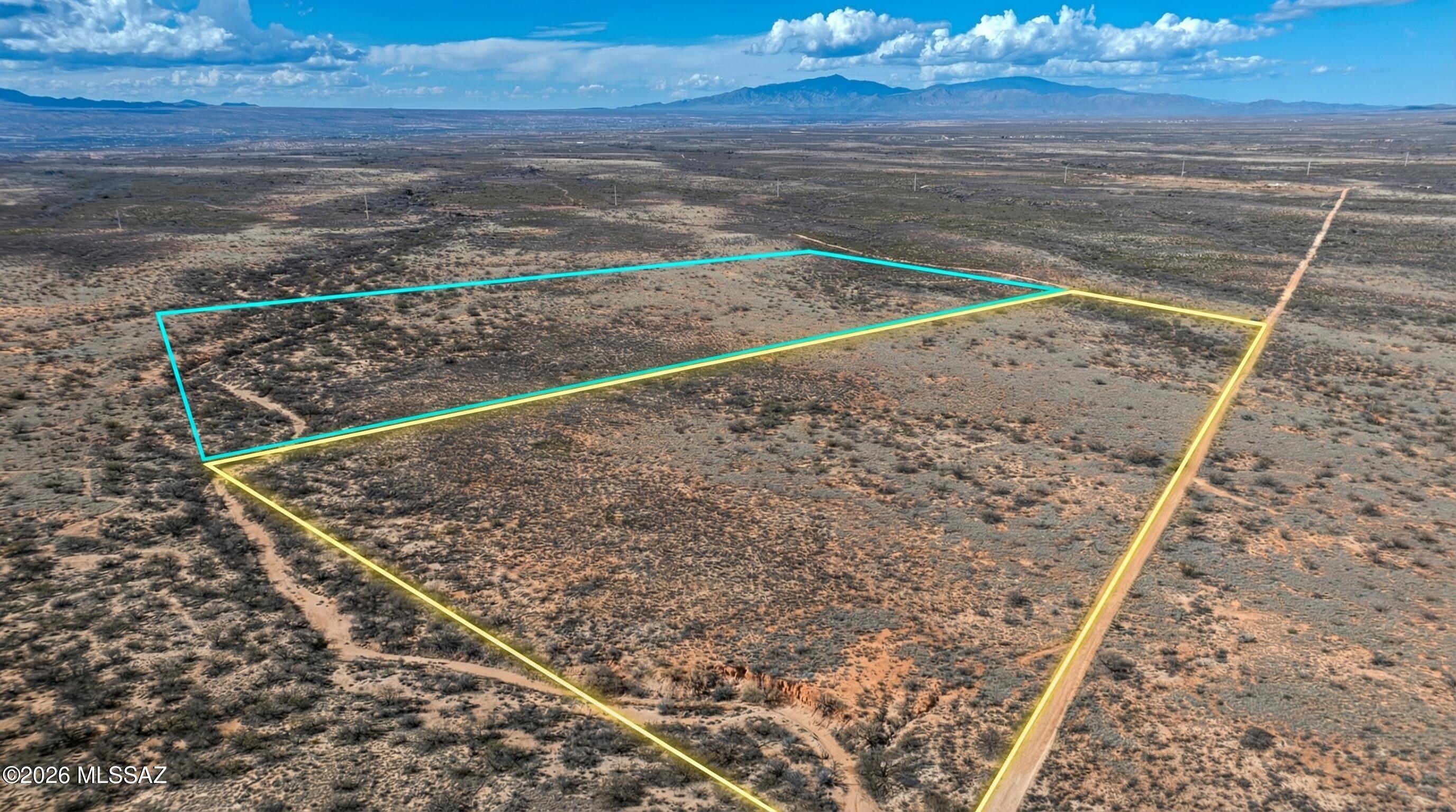 This is a great lot located on the West side of the Dragoon Mountain Ranch with evening lights of Benson in the distance. There is already a building pad centrally located on high ground. The lot is easily accessible and close to the South gate for the convenience of accessing Tombstone or Saint David. Did I mention the lot next door is available for sale from a different owner which would give you a 72 acre parcel.