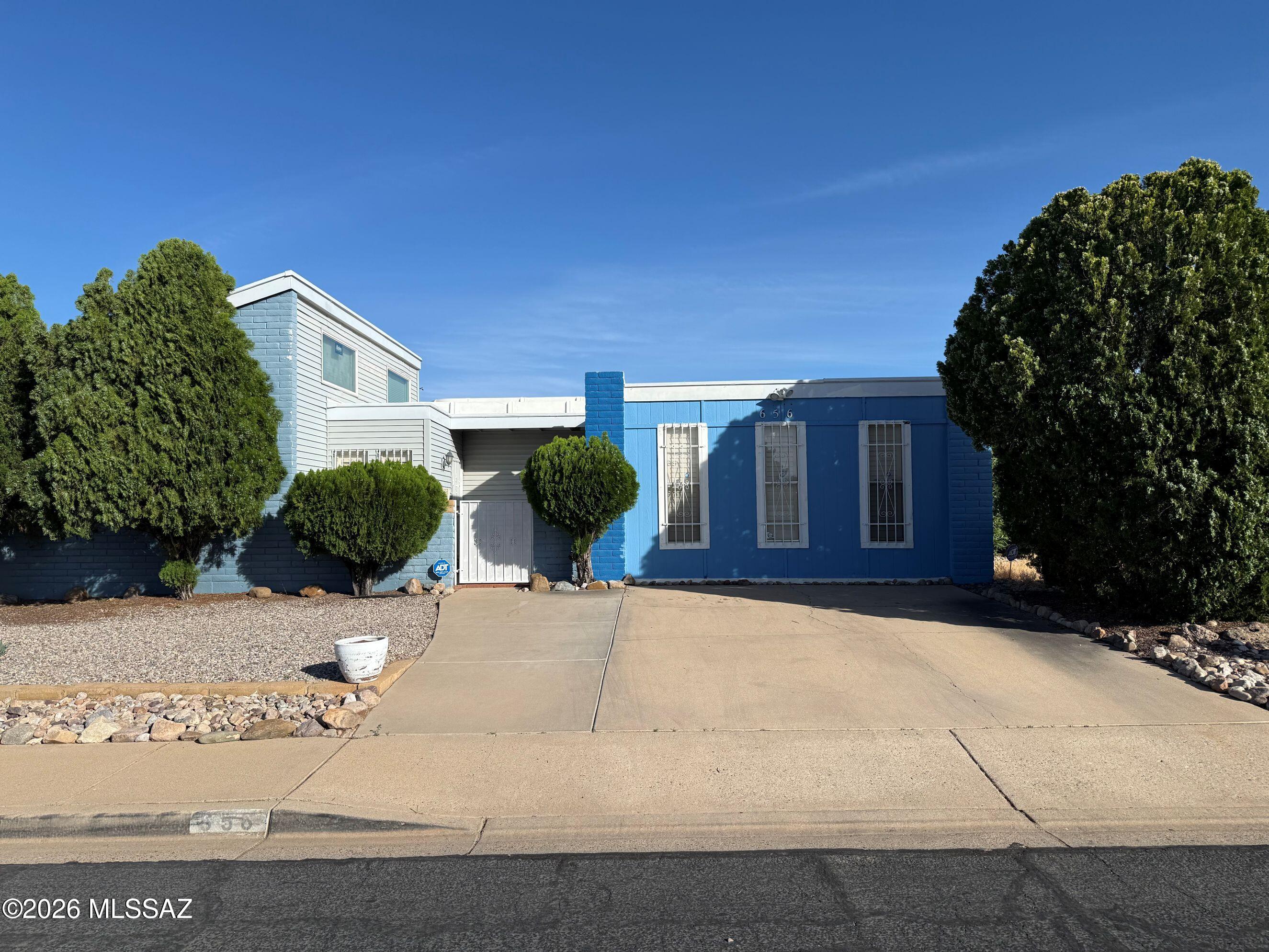 This 5 bedroom 2 bath home is ideally situated near Buffalo Soldier Trail and in close proximity to FT. HUACHUCA. The HUGE 5th bedroom has dual closets and offers a variety of uses....homeschool, sewing, office, bedroom, game, exercise, etc....Two nice patio rooms and living room to dress to your taste, and with a cozy fireplace in the entry living room will give this home the welcoming invite every guest enjoys!