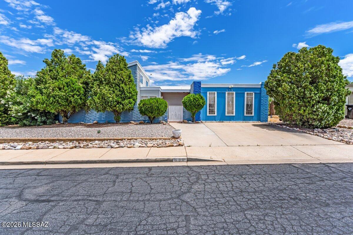 This 5 bedroom 2 bath home is ideally situated near Buffalo Soldier Trail and in close proximity to FT. HUACHUCA. The HUGE 5th bedroom has dual closets and offers a variety of uses....homeschool, sewing, office, bedroom, game, exercise, etc....Two nice patio rooms and living room to dress to your taste, and with a cozy fireplace in the entry living room will give this home the welcoming invite every guest enjoys!