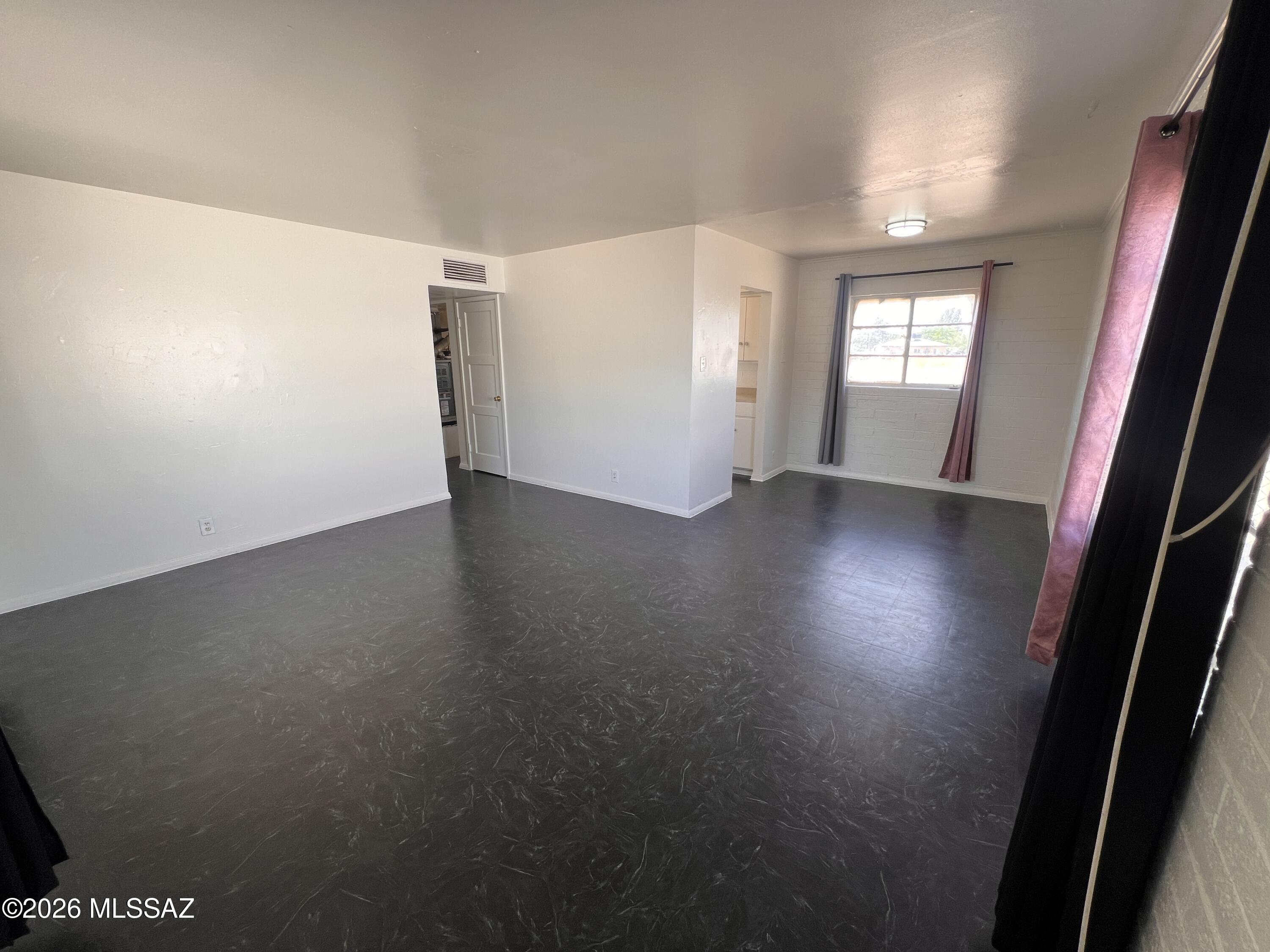 Freshly painted. Spacious 3 bed/ 1 bath townhome. Carpet in bedrooms. Vinyl throughout rest of house. Security doors on front and back door. LED lighting. Washer/dryer hookups. Designated parking. Stove and fridge will be provided. Close to schools, shopping, entertainment, dining, parks, library, Boys and Girls Club and transportation. Dogs allowed with a one time $150 non refundable pet fee, per pet. 12 month lease. Large backyard. Section 8 accepted. Tenant pays all utilities.