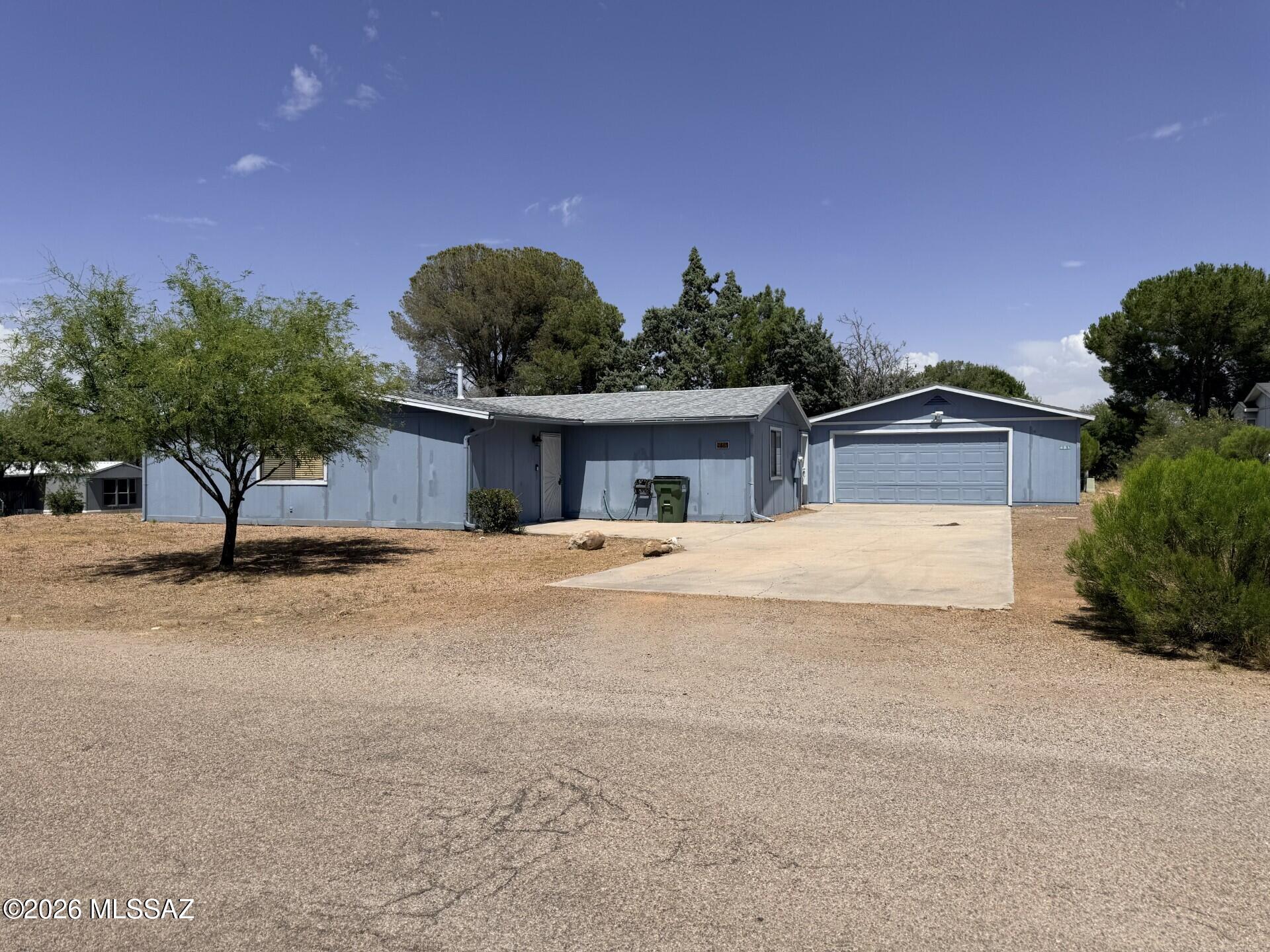 Charming 3-bedroom, 2-bath home featuring a fenced yard and garage. Enjoy comfortable living with ample outdoor space for pets, gardening or entertaining. Conveniently located between Tucson and Sierra Vista with easy access to I-10, shopping, dining, and local amenities. A great opportunity for those seeking small-town living with an easy commute to major employment centers.