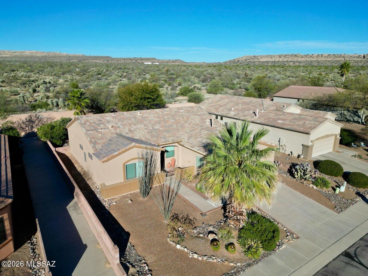 Discover your own desert sanctuary in this 2-bed + den home, perfectly positioned to back directly onto the West Desert trails. Wake up to quiet surroundings and exceptional birding right from your backyard--owners have documented more than 100 bird species on site. This is a rare opportunity to enjoy the beauty and serenity of the desert while staying connected to nature every day. Recent updates offer peace of mind for years to come, including a new roof (2024), windows (2023), exterior paint (2023), and HVAC (2018). Inside, the kitchen features solid granite countertops, 42'' upper cabinets, and convenient slide-outs in the lower cabinets for easy storage. A versatile den provides the perfect space for a home office, guest room, or hobby area, while the laundry room includes additional room for a small office or extra storage. The 2' garage extension adds valuable space for larger vehicles.
As a GVR member, you'll also enjoy access to pools, fitness centers, clubs, and a lively social calendar.