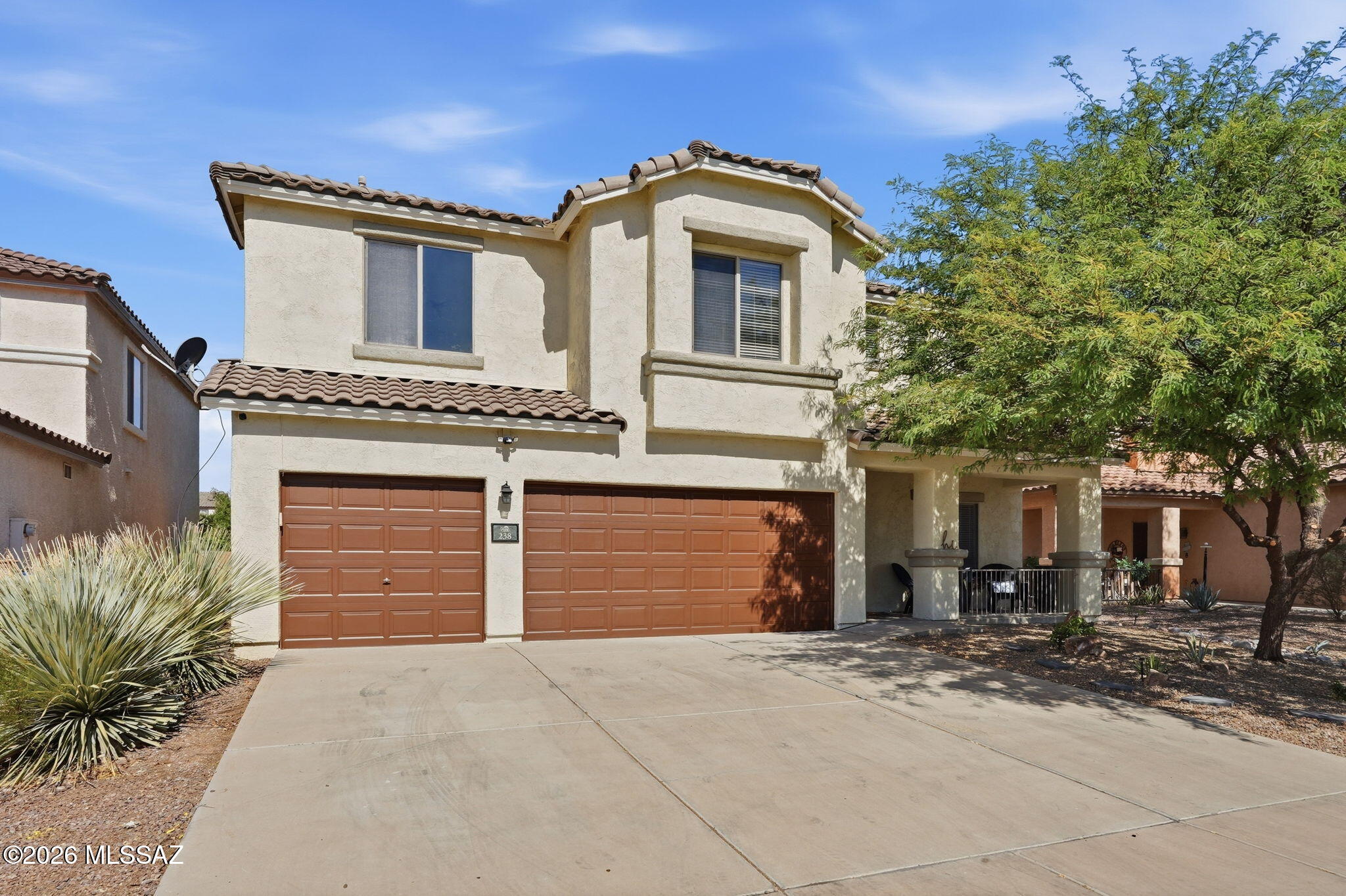 Spacious Pulte built home in desirable Rancho Sahuarita! This 4bd/3ba home offers over 3000sqft of living space with a flexible floor plan perfect for today's lifestyle. The main level features a bedroom and full bathroom ideal for guests or multi-generational living. Enjoy open-concept kitchen with abundant cabinet space and a large living area for entertaining. Upstairs you will find a spacious loft, generously sized bedrooms complete with walk-in closets, and a private primary suite with 2 walk-in closets. The 3-car garage provides plenty of storage while the backyard offers beautiful Arizona sunset views. Located in the sought-after Rancho Sahuarita community with access to pools, parks, trails, fitness center, clubhouse and more!