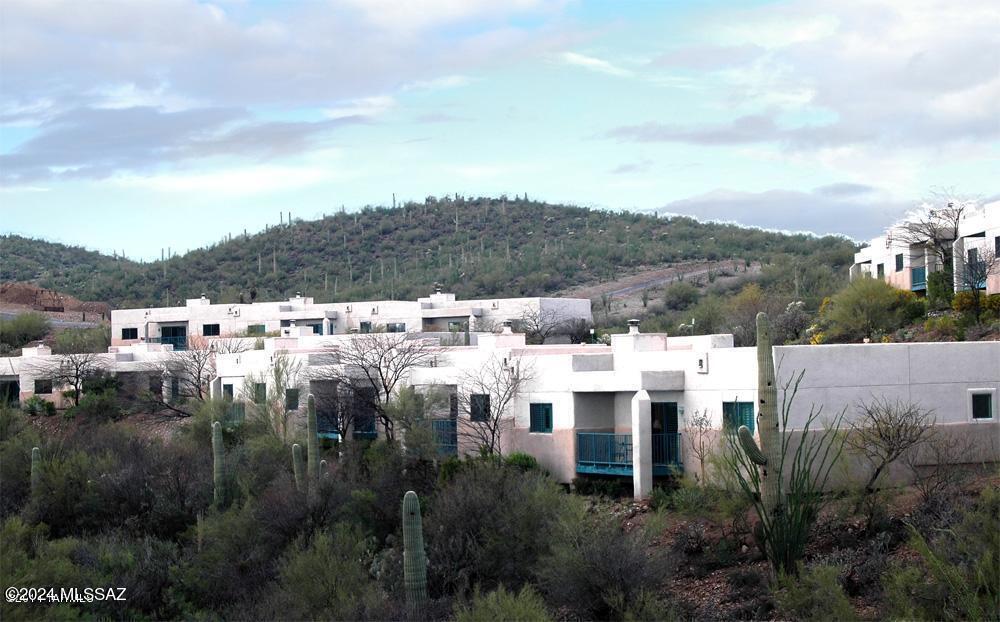This spacious single level unit features 2 bedrooms and 2 bathrooms, including a private separate entrance, providing a comfortable and convenient living space. This Casita with Southwestern Flair is fully furnished with all housewares, linens, appliances, etc. and also includes WiFi and cable TV. This is a split floor plan with two master suites & each side has an HVAC. Primary bedroom with King Bed and the bath features a separate shower and bathtub. Two double beds and kitchenette in other suite & full bath plus a private entrance for extra guest convenience. 
The community offers a refreshing pool, fitness room & spa.  Located just west of downtown you'll have access to a variety of dining, shopping & entertainment option
