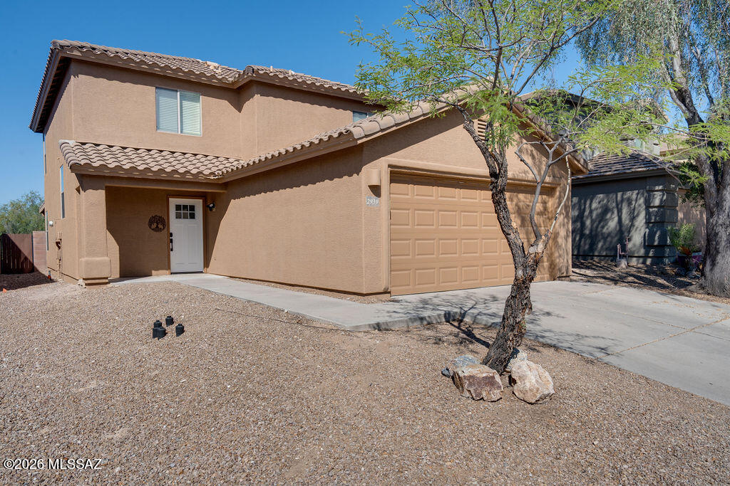 Welcome to 2939 S Pantano Edge Drive, a thoughtfully updated 4-bedroom, 2-bath home in Tucson's Pantano's Edge community.
With 1,844 square feet, a split floor plan, and a spacious upstairs loft, the home offers the kind of flexibility that adapts as life changes. The primary suite is tucked away on the main level, while three additional bedrooms and the loft upstairs provide space for guests, working from home, hobbies, movie nights, or simply having room to spread out. Mountain views from the loft add an unexpected bonus to the everyday experience of living here. Fresh interior paint and an open-concept layout create a clean, comfortable feel throughout the home. The living, dining, and kitchen spaces connect naturally, making it easy to spend time together while still giving everyone room to do their own thing.
One of the home's standout features is its location along the Pantano Wash. With open space directly behind the property and miles of nearby walking, running, and biking trails woven throughout the area, it's easy to enjoy the outdoors without adding another stop to your day. The setting creates a sense of openness and privacy that's increasingly difficult to find.
The backyard has been upgraded with low-maintenance turf, creating a space that's ready to enjoy without demanding your weekends. Whether you're relaxing with a morning coffee, letting pets play, or gathering with friends, it's designed to be used rather than maintained.
Located on Tucson's desirable East Side, Pantano's Edge offers convenient access to shopping, dining, parks, Davis-Monthan Air Force Base, and Interstate 10 while still feeling removed from the pace of the city.
If you've been searching for a home that offers practical space, flexible living areas, mountain views, direct access to outdoor recreation, and a low-maintenance lifestyle, this is one you'll want to experience in person.