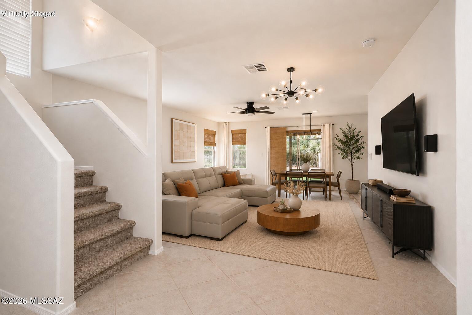 Welcome to 2939 S Pantano Edge Drive, a thoughtfully updated 4-bedroom, 2-bath home in Tucson's Pantano's Edge community.
With 1,844 square feet, a split floor plan, and a spacious upstairs loft, the home offers the kind of flexibility that adapts as life changes. The primary suite is tucked away on the main level, while three additional bedrooms and the loft upstairs provide space for guests, working from home, hobbies, movie nights, or simply having room to spread out. Mountain views from the loft add an unexpected bonus to the everyday experience of living here. Fresh interior paint and an open-concept layout create a clean, comfortable feel throughout the home. The living, dining, and kitchen spaces connect naturally, making it easy to spend time together while still giving everyone room to do their own thing.
One of the home's standout features is its location along the Pantano Wash. With open space directly behind the property and miles of nearby walking, running, and biking trails woven throughout the area, it's easy to enjoy the outdoors without adding another stop to your day. The setting creates a sense of openness and privacy that's increasingly difficult to find.
The backyard has been upgraded with low-maintenance turf, creating a space that's ready to enjoy without demanding your weekends. Whether you're relaxing with a morning coffee, letting pets play, or gathering with friends, it's designed to be used rather than maintained.
Located on Tucson's desirable East Side, Pantano's Edge offers convenient access to shopping, dining, parks, Davis-Monthan Air Force Base, and Interstate 10 while still feeling removed from the pace of the city.
If you've been searching for a home that offers practical space, flexible living areas, mountain views, direct access to outdoor recreation, and a low-maintenance lifestyle, this is one you'll want to experience in person.