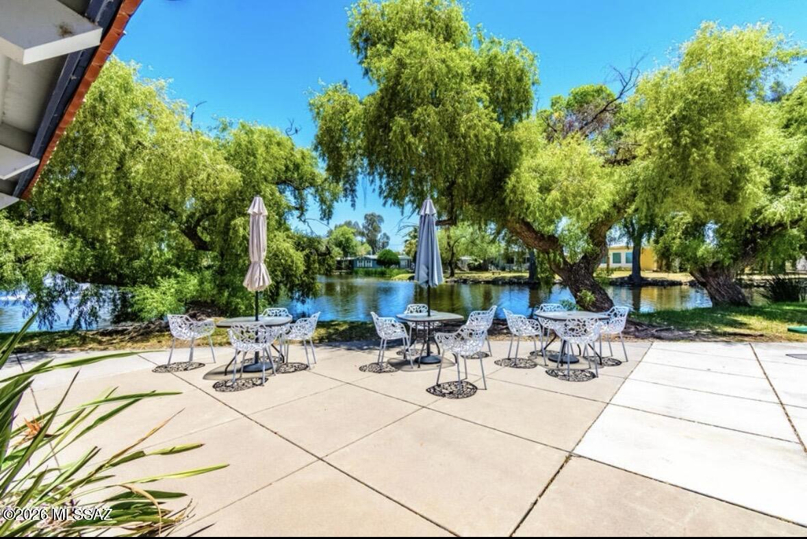 STEPS FROM SWAN LAKE!  Welcome to Swan Lake Estates, a gated 55+ community offering resort-style living in central Tucson. Enjoy a scenic lake with fishing and a unique island featuring live music.
Community amenities include pickleball, horseshoes, bocce ball, shuffleboard, spa, two pools, billiards, library, two clubhouses, and an exercise room--perfect for an active lifestyle.
Lot rent covers water, sewer, and trash for easy, low-maintenance living. Conveniently located near restaurants, shopping, medical services, the Tucson Mall, and the Auto Mall.
Ideal for snowbirds or full-time residents looking to enjoy Tucson's beautiful weather year-round.