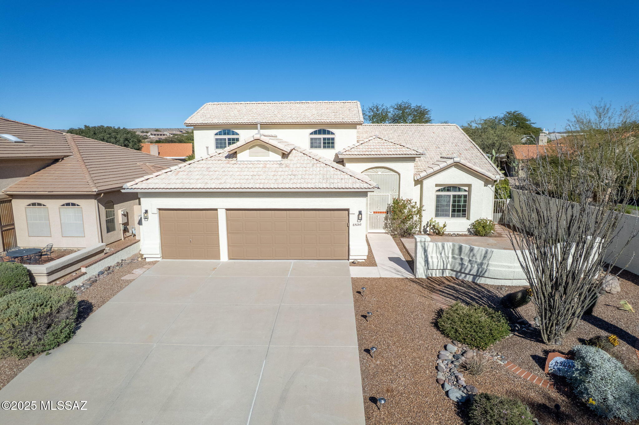 Stunning remodeled Galleria with mountain views. Enter the front door into a bright, light filled living room and formal dining with brand new LVP flooring throughout. A dream gourmet kitchen with new two tone cabinets, large island, quartz countertops, stainless steel appliances, tons of storage, a huge pantry and family room with gas fireplace. The large primary suite includes a sitting area, two walk-in closets, remodeled bath with gorgeous walk in shower, soaking tub and dual vanity. Also includes nice office plus powder bath.  Laundry room with storage and utility sink leads to 3 car garage. 2 bed/1 bath upstairs ''casita'' perfect for guests.  New interior/exterior paint.