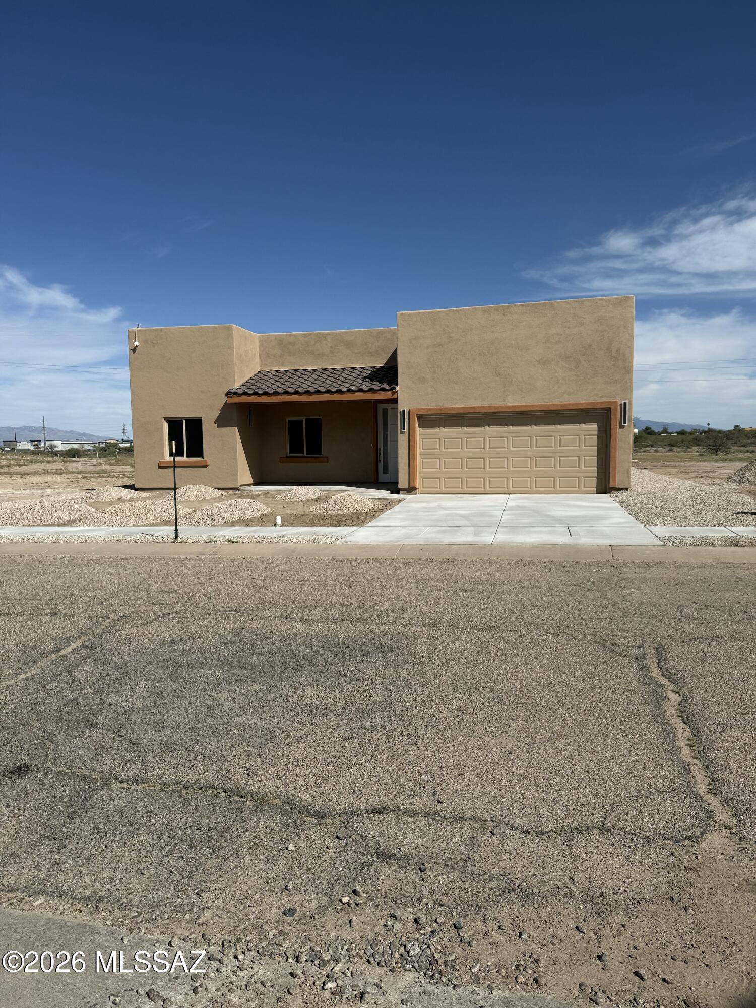 Beautiful, new construction home--this thoughtfully designed property features 9' ceilings & an open floor plan with a split-bedroom layout for added privacy. The spacious kitchen, complete with a large island & granite countertops, offers plenty of prep & gathering space. Both bathrooms showcase double vanities & custom-tiled showers. Tile flooring throughout adds warmth & durability. A versatile game room provides extra space for entertaining, hobbies, or a home office. Built with spray foam insulation for enhanced energy efficiency & comfort. Low-maintenance gravel landscaping in both the front and back. A spacious 2-car garage completes the package. TONS of upgrades throughout--DESIGNED TO IMPRESS & MOVE IN READY!