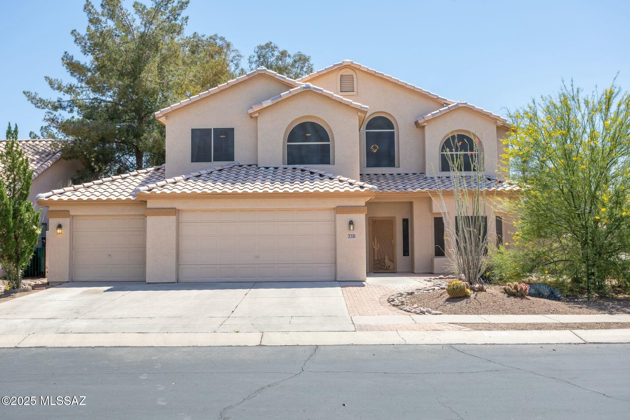 Beautiful 5-bed, 3-bath home in Continental Ranch! Nestled on a corner displaying a desert front yard and a 3-car garage w/extended driveway. You'll love the inviting living room with a bay window and an adjacent formal dining room! The family room opens to the kitchen, boasting a fireplace for chilly nights. The kitchen has built-in appliances, quartz counters, ample white cabinets, a breakfast bar, and a cozy nook w/sliding doors to the back. Spacious double-door main bedroom features a sitting area & vaulted ceilings! Also including an ensuite with a separate tub/shower, dual sinks, & a walk-in closet. One bedroom downstairs. Enjoy relaxing & entertaining in the large backyard offering shade trees and a covered patio w/pavers extension! Ready to move in! Welcome home!  Agent/Owner