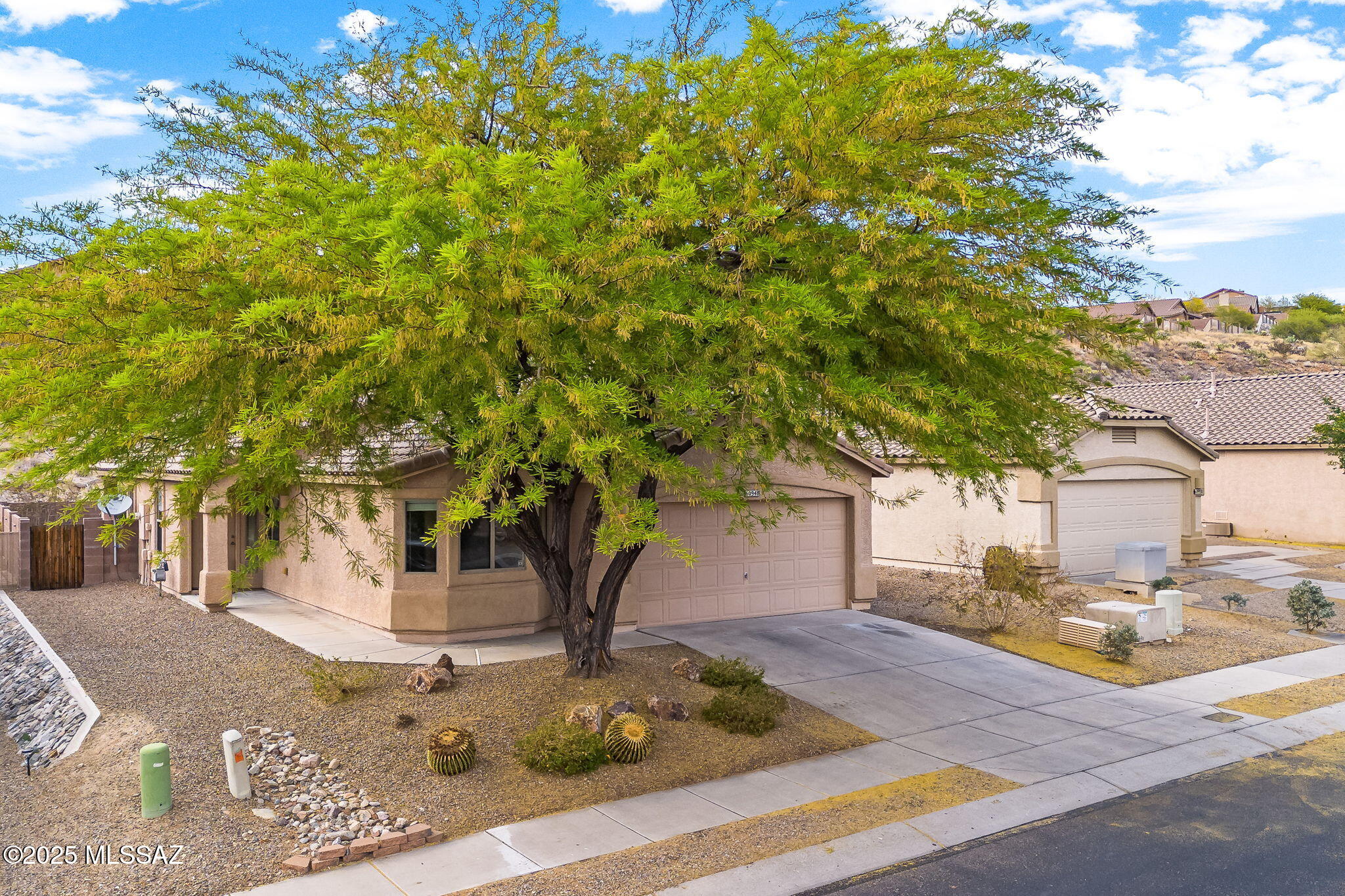 Seller Carryback/Financing option available! Charming 3-Bedroom Home in Eagle Crest Ranch - Saddlebrooke. Nestled on a quiet cul-de-sac in the, this 3-bedroom, 2-bathroom home offers 1,544 square feet of thoughtfully designed living space. The open floor plan welcomes you with a spacious great room featuring vaulted ceilings and a sliding glass door that opens to the covered patio—perfect for indoor-outdoor living. A versatile den provides an ideal space for a private home office or study. The kitchen boasts stainless steel appliances, a dining area, and a convenient breakfast bar, making it great for both casual meals and entertaining. The primary suite includes a large window for natural light, and a private en-suite bathroom with dual vanities and walk-in shower. The functional split bedroom plan ensures privacy.

Enjoy a low-maintenance backyard with a covered patio, ideal for relaxing and enjoying Arizona's beautiful weather.

This home combines comfort, functionality, and a great location - don't miss out!