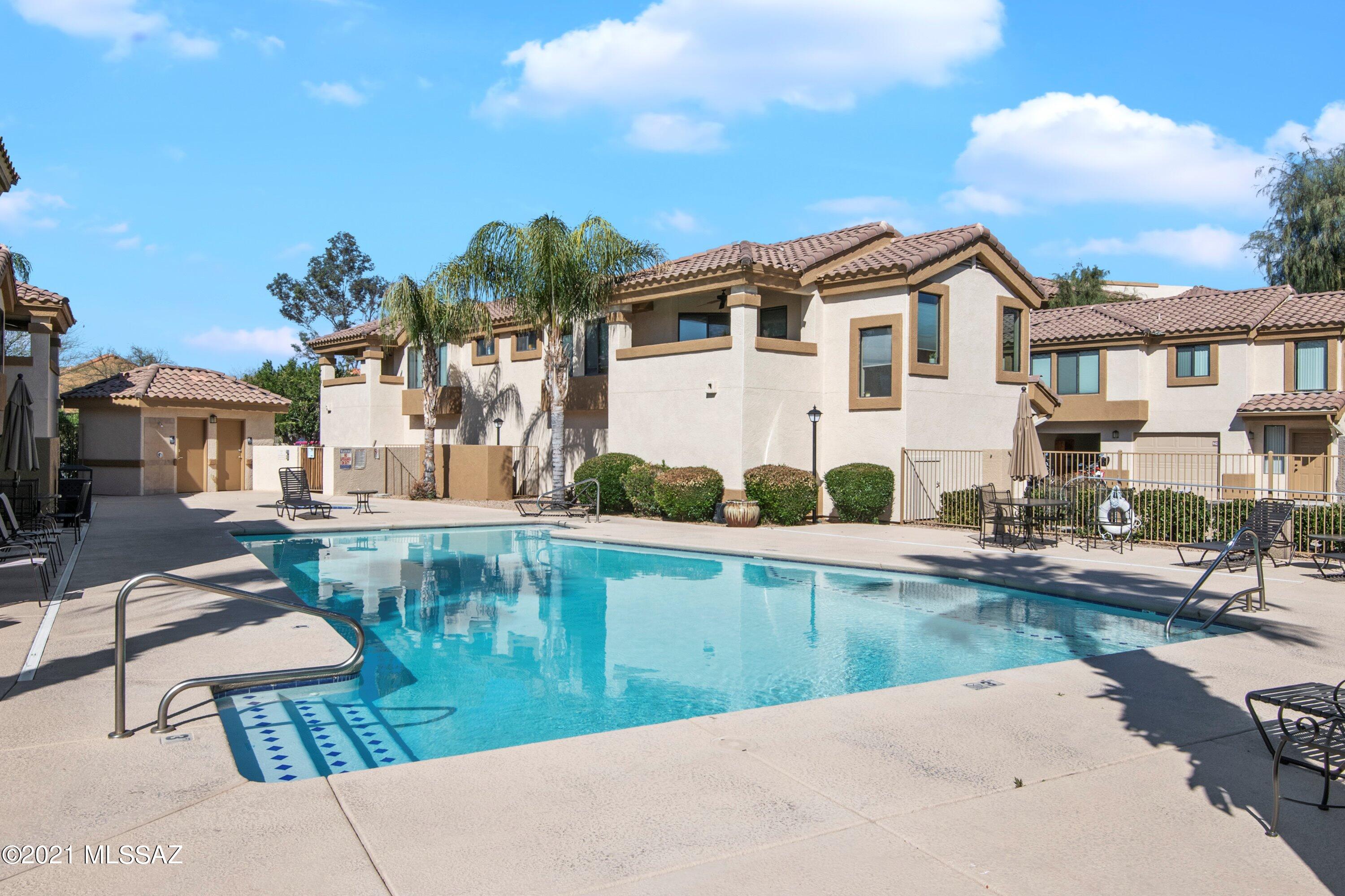 Perfect location!  This 3BD/2BA condo is located in the popular community of Villas at Hacienda del Sol.  Access to the loop, resort like amenities and close to shopping, restaurants, U of A and more.  Spacious living area, updated kitchen, no carpet and located next to the pool.  Washer/dryer included in the condo.