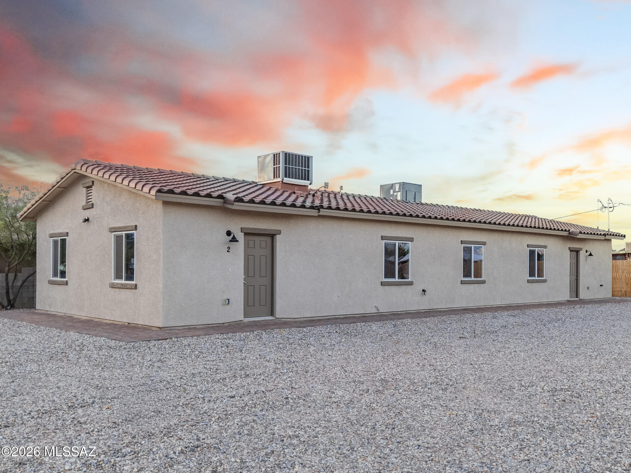 Beautiful New Construction DUPLEX . One unit 3 bedroom 2 bath - 1079 sq feet -parking space 2. 2nd Unit 2 bedroom 1 bath - 803 sq feet - Great Investment opportunity Or live in one and rent the other! Beautiful Granite counters through out home, new stainless steel appliances, tile in all areas. Close to the University of Arizona and       I-19 & I-10 for easy commuting as well as shopping around the corner.Listing Agent is related to Seller.