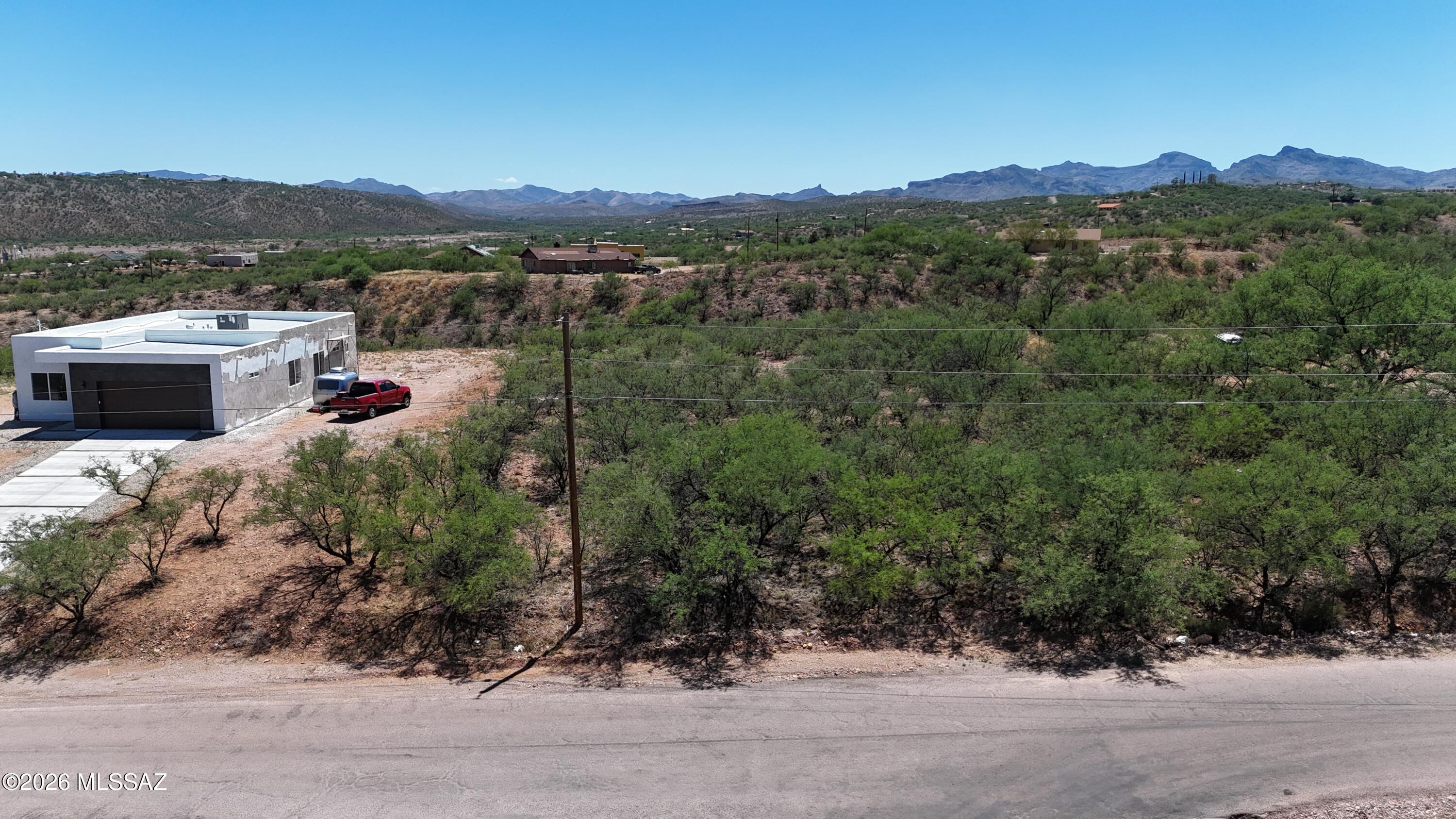 Popular area of Rio Rico, close to the Highway entrance, schools and the shopping plaza and post office.  Just over 1 acre, paved street, electric and water at the street.
Won't last long!